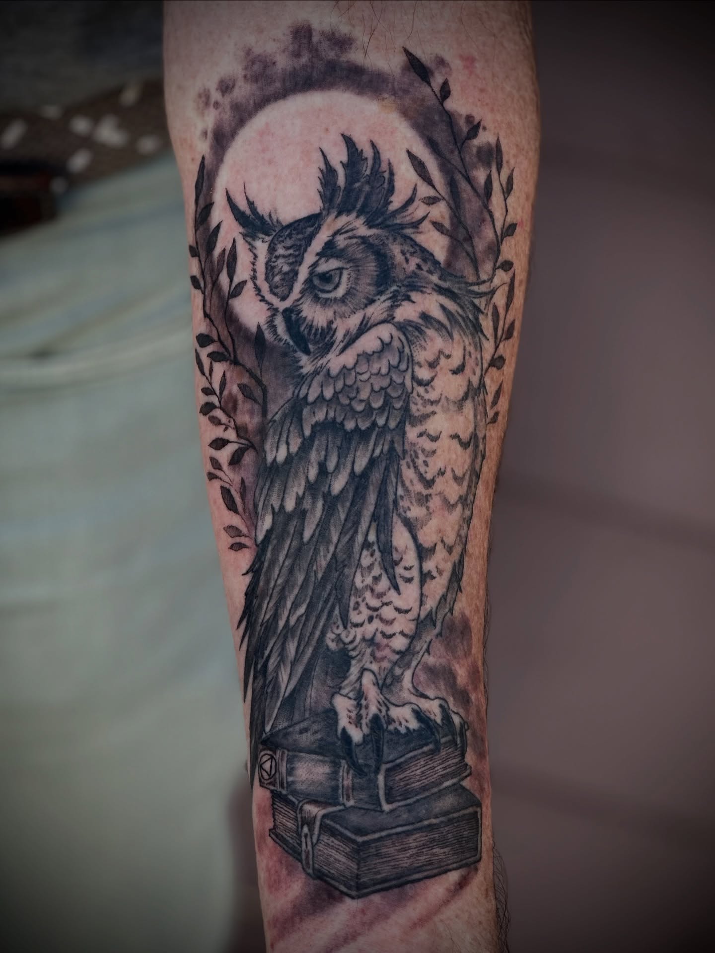 Owl realism tattoo on the forearm by Culleton Paramore