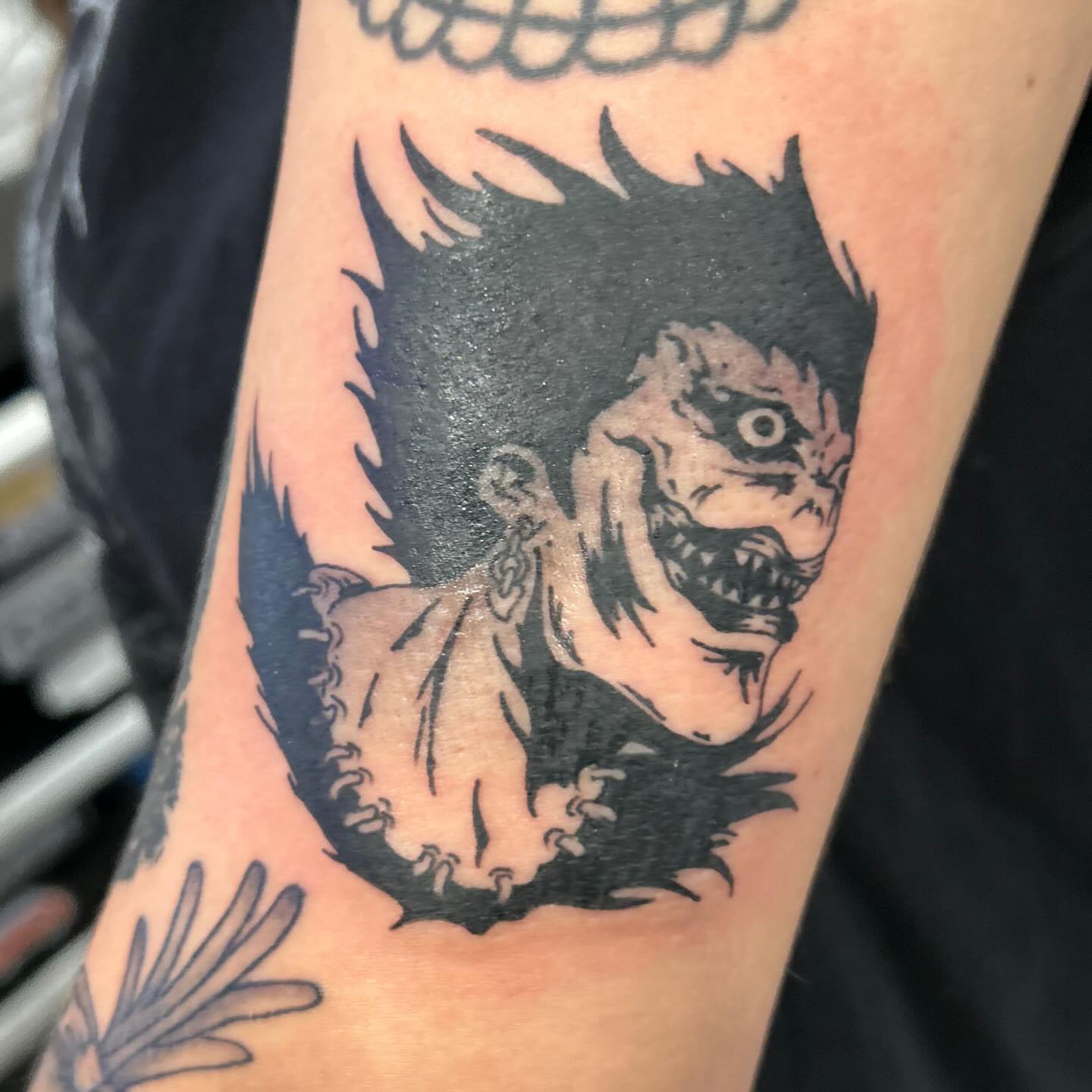 Demon black and grey tattoo on the forearm by Jbtattoo Artistry