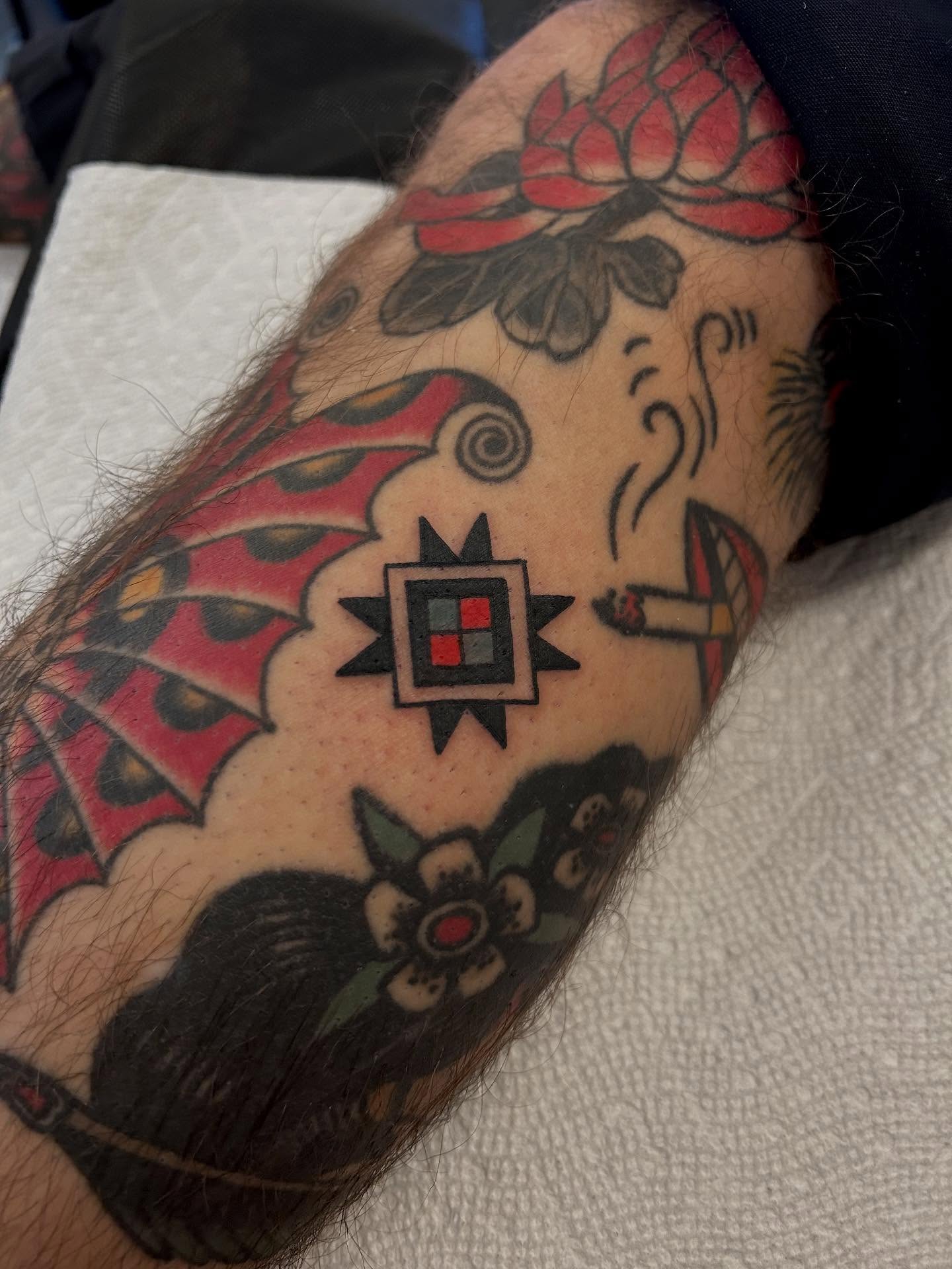 Geometric pattern American traditional tattoo on the forearm by Christian Lasyone