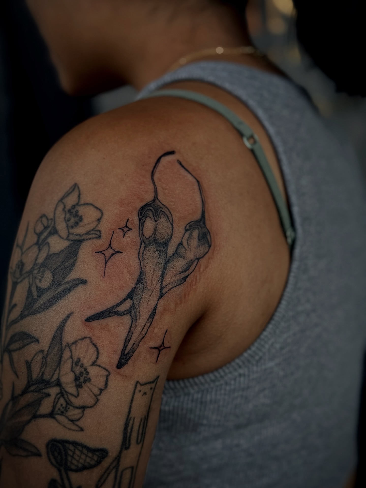 Peppers and flowers black and grey tattoo on the shoulder by 𝙹𝙰𝚉𝚉 𝙲𝙷𝙰𝙾