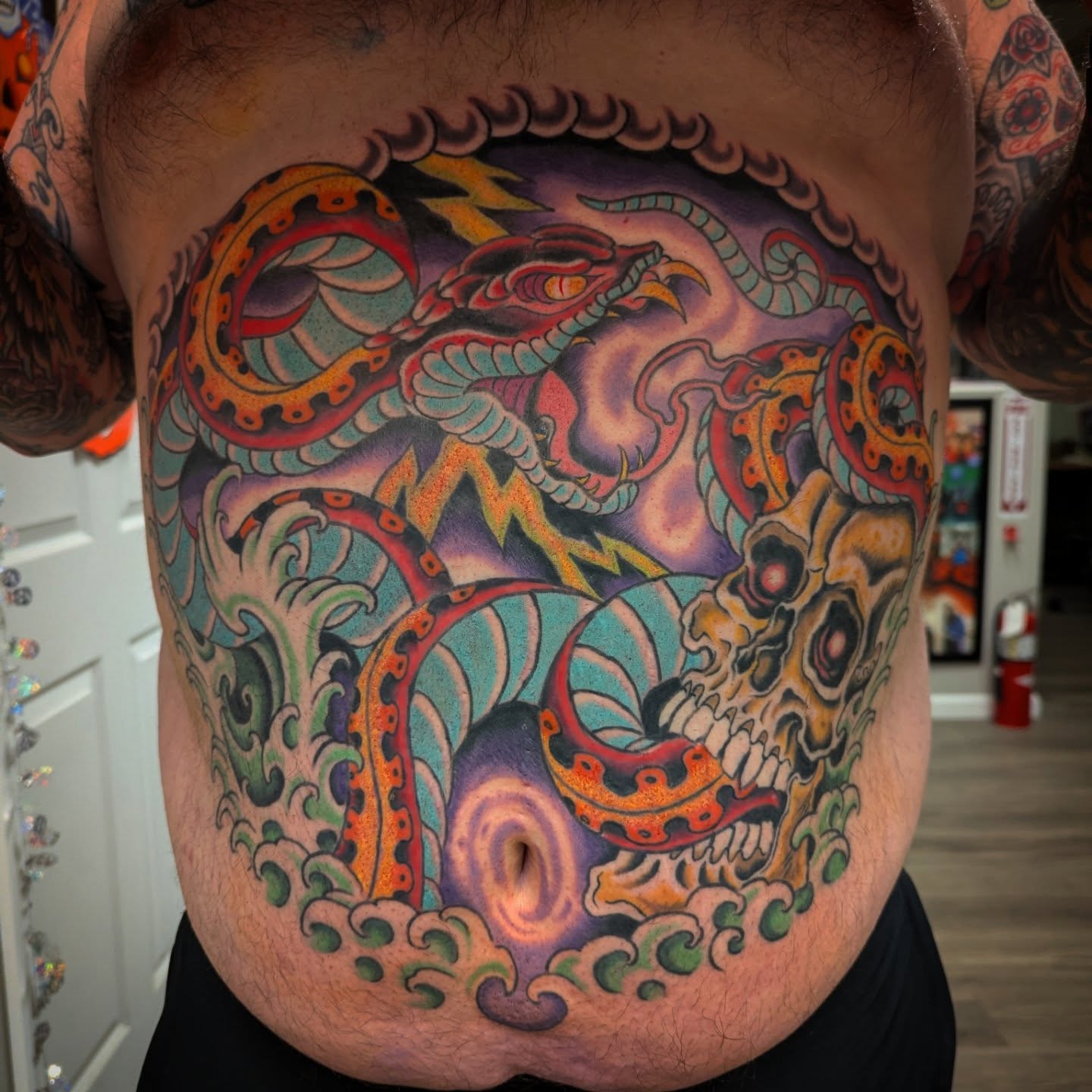 Dragon and skull japanese irezumi tattoo on the chest by Ryan Slegel