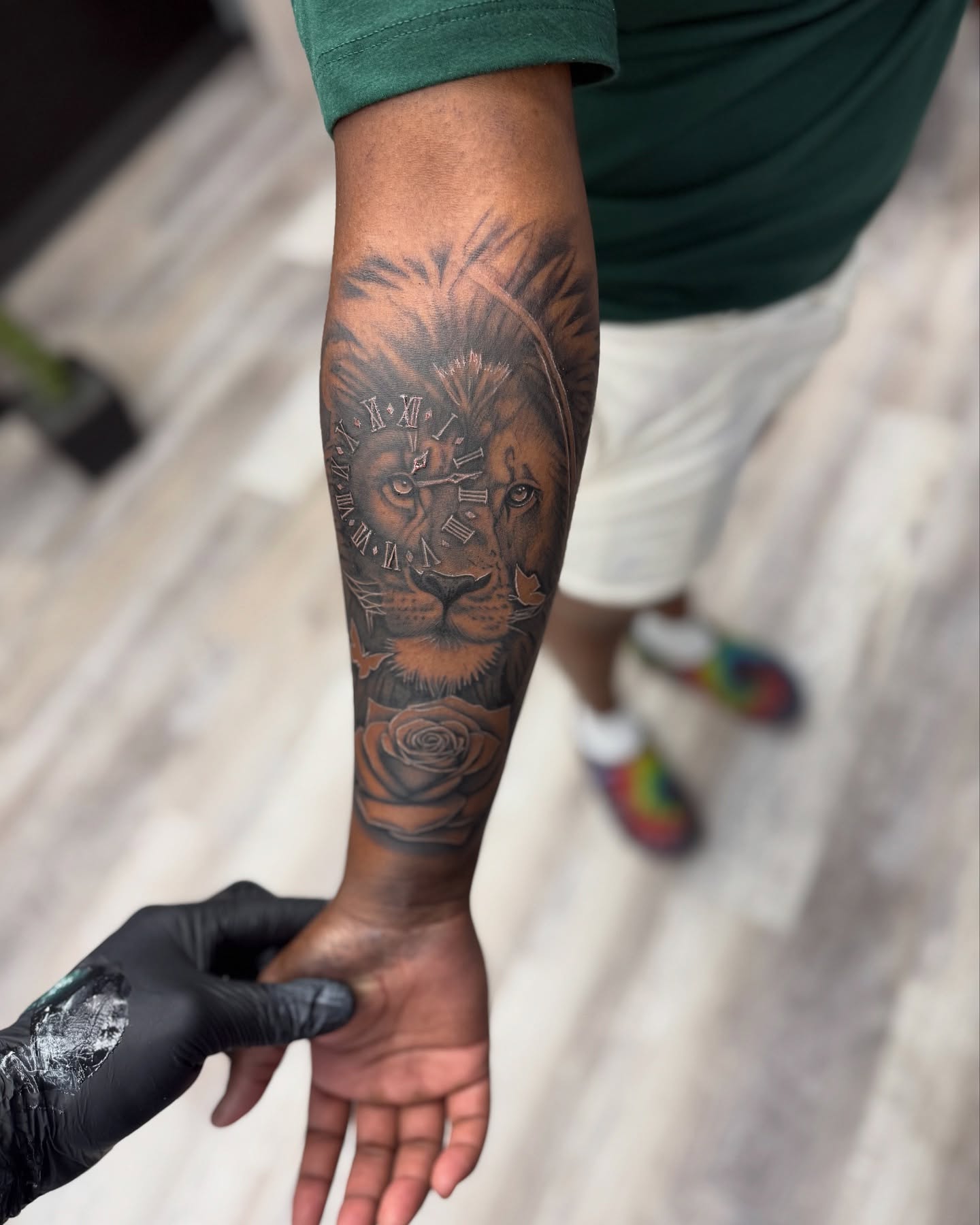 Lion realism tattoo on the forearm by Atlanta Tattoo Artist