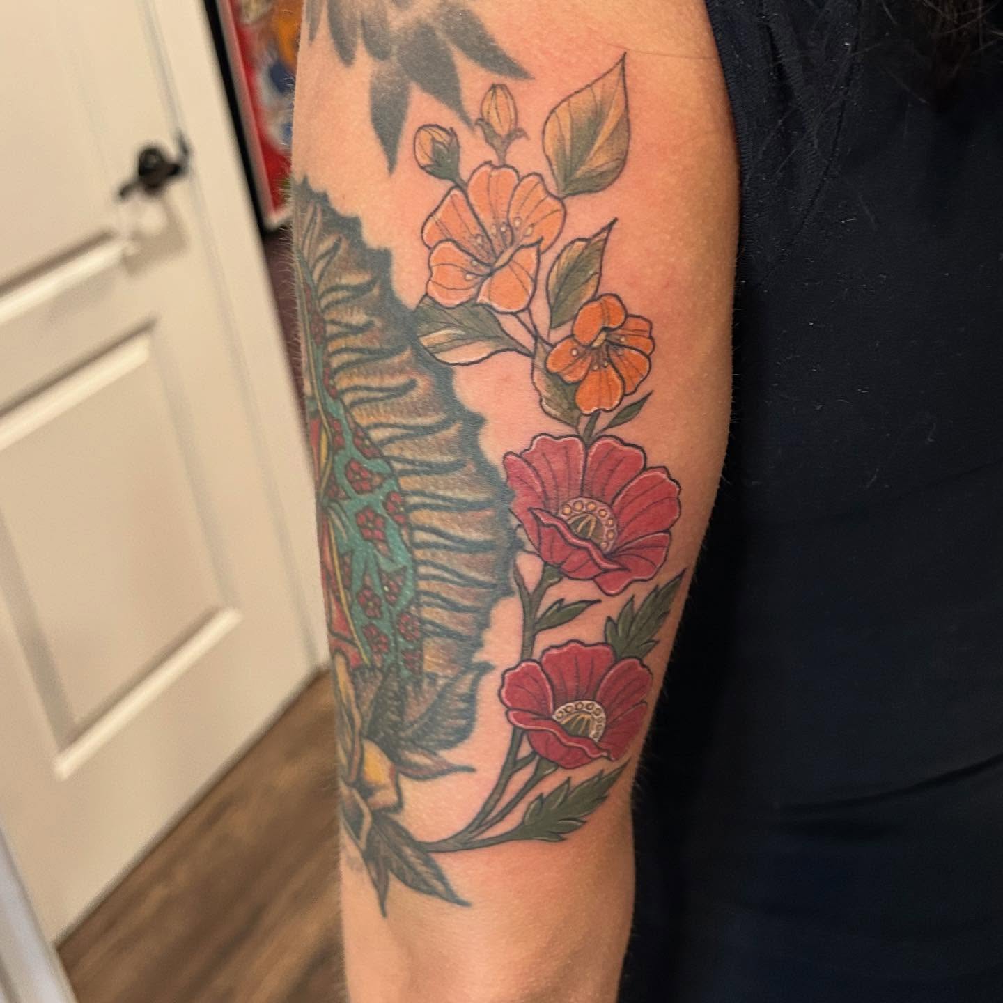 Floral arrangement American traditional tattoo on the forearm by Elizabeth (Lib), Murfreesboro, Tennessee