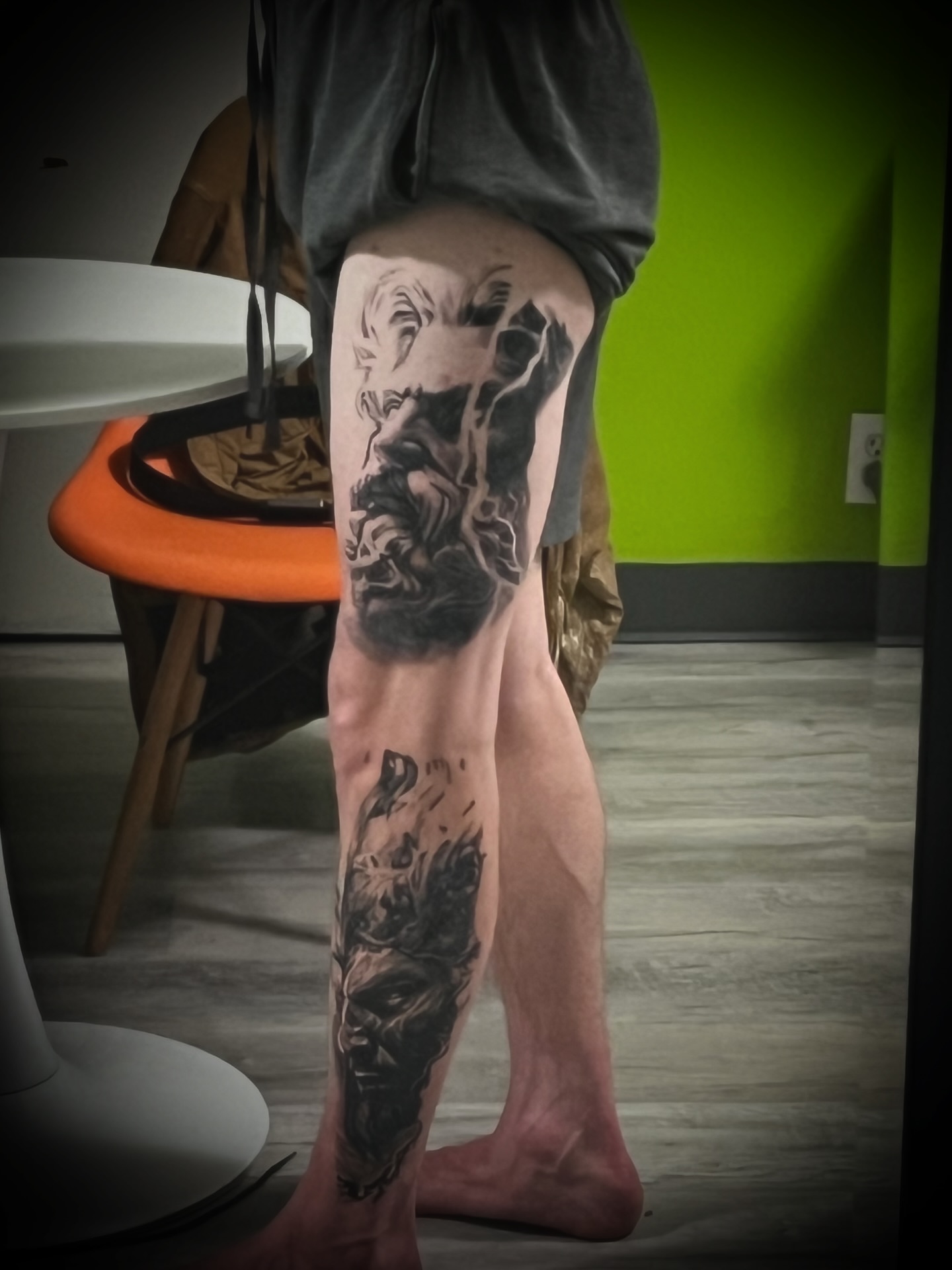 Bearded man realism tattoo on the leg by Julian Olson