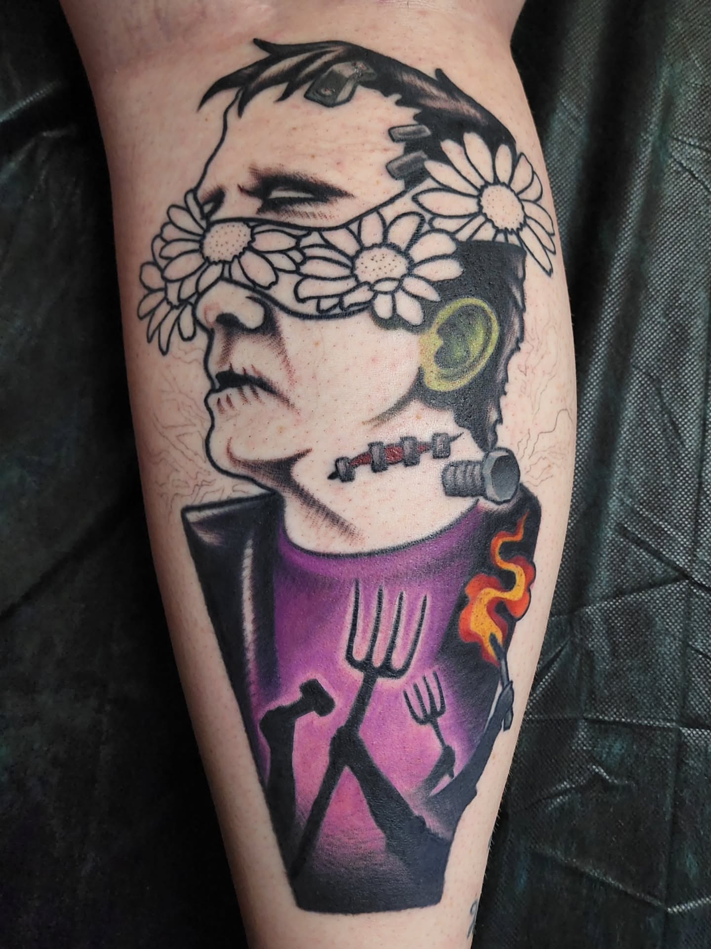 Portrait with flowers and collar realism tattoo on the forearm by Shawna Goettsche