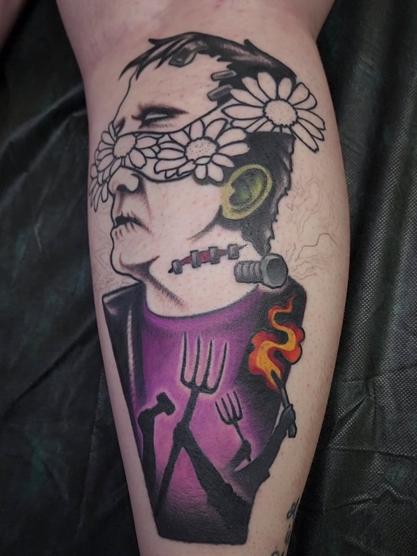 Portrait with flowers and tools realism tattoo on the forearm by Shawna Goettsche