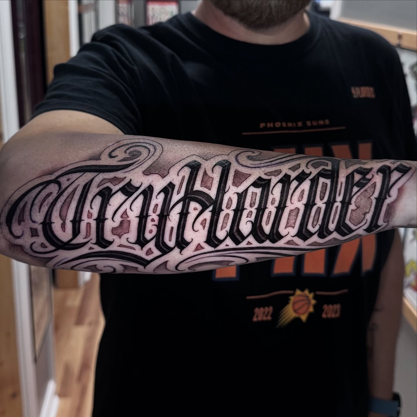 Script lettering lettering script tattoo on the forearm by Jake Fujimura
