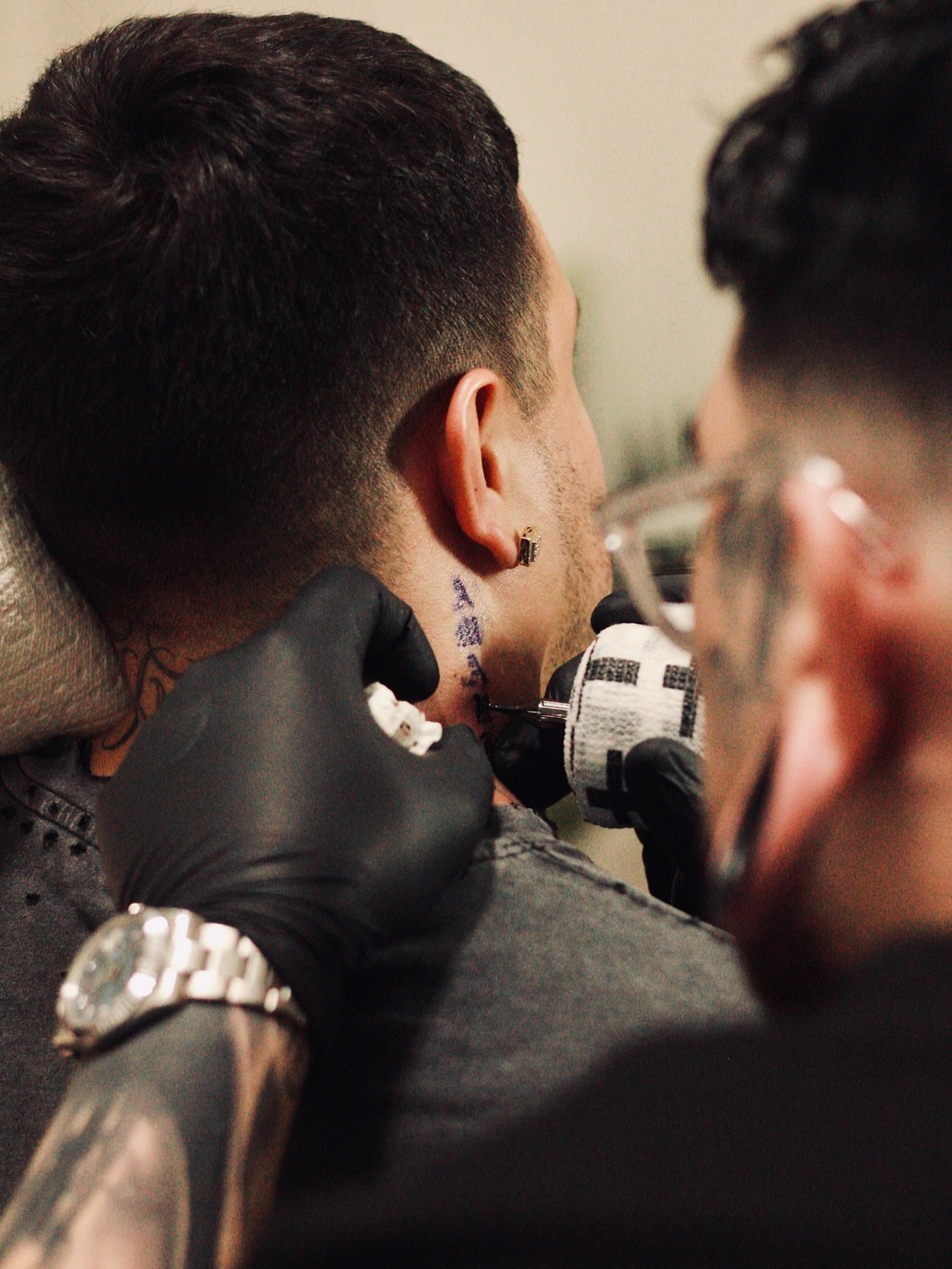Ear tattoo black and grey tattoo on the neck by Jesse Temores