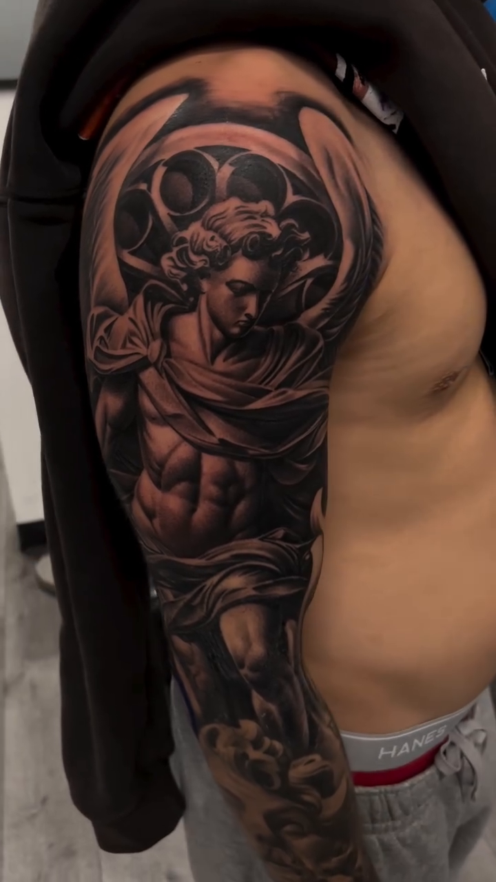 Angelic figure realism tattoo by Antonio Pavić, Los Angeles, California