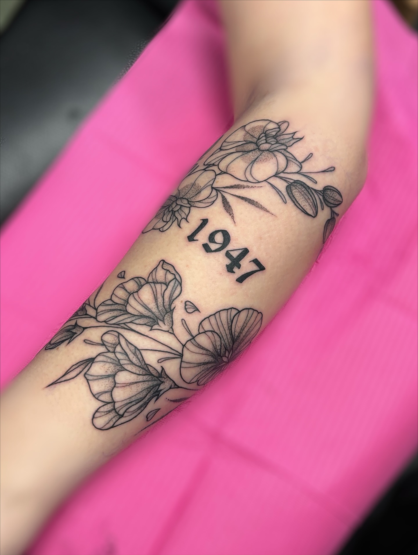 Floral design with year black and grey tattoo on the forearm by ✿ sadie winter ✿