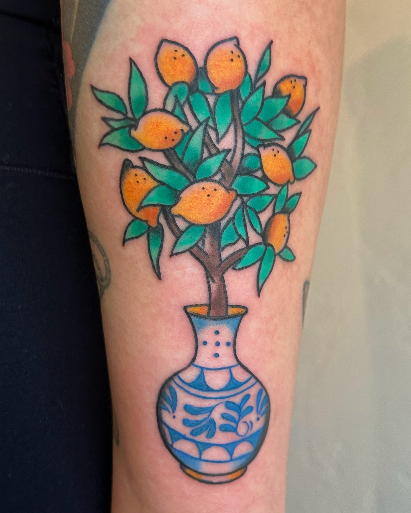 Lemon tree in vase dotwork tattoo on the forearm by Paige Ochoa