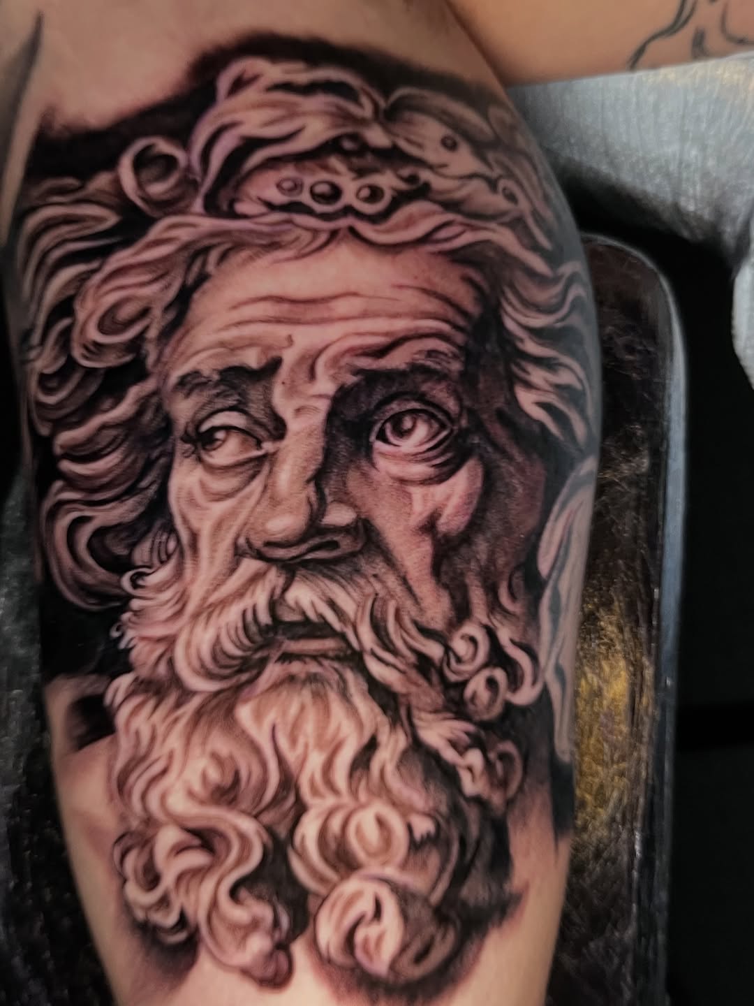 Portrait of a bearded man surrealism tattoo on the forearm by "el asere, el zurdo"