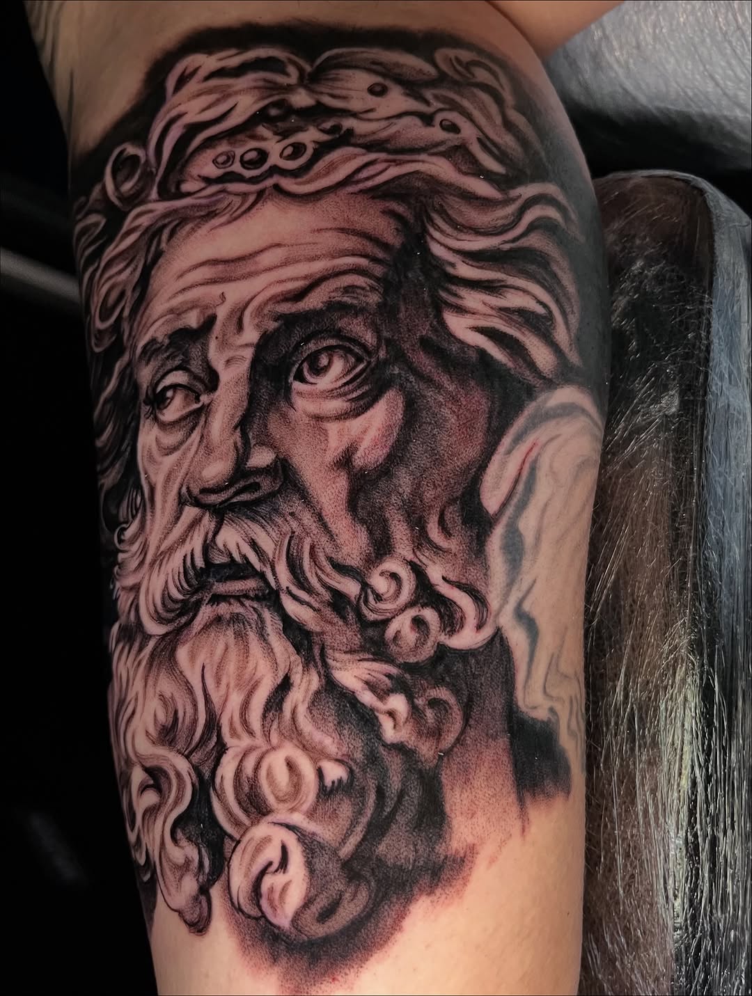 Portrait of an old man surrealism tattoo on the forearm by "el asere, el zurdo"
