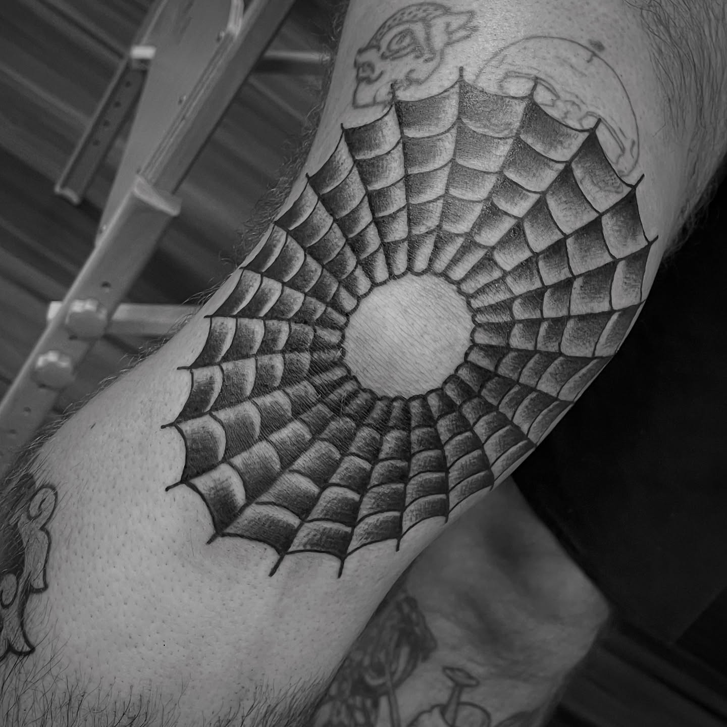 Spiderweb black and grey tattoo on the forearm by adamsayre, San Diego, California