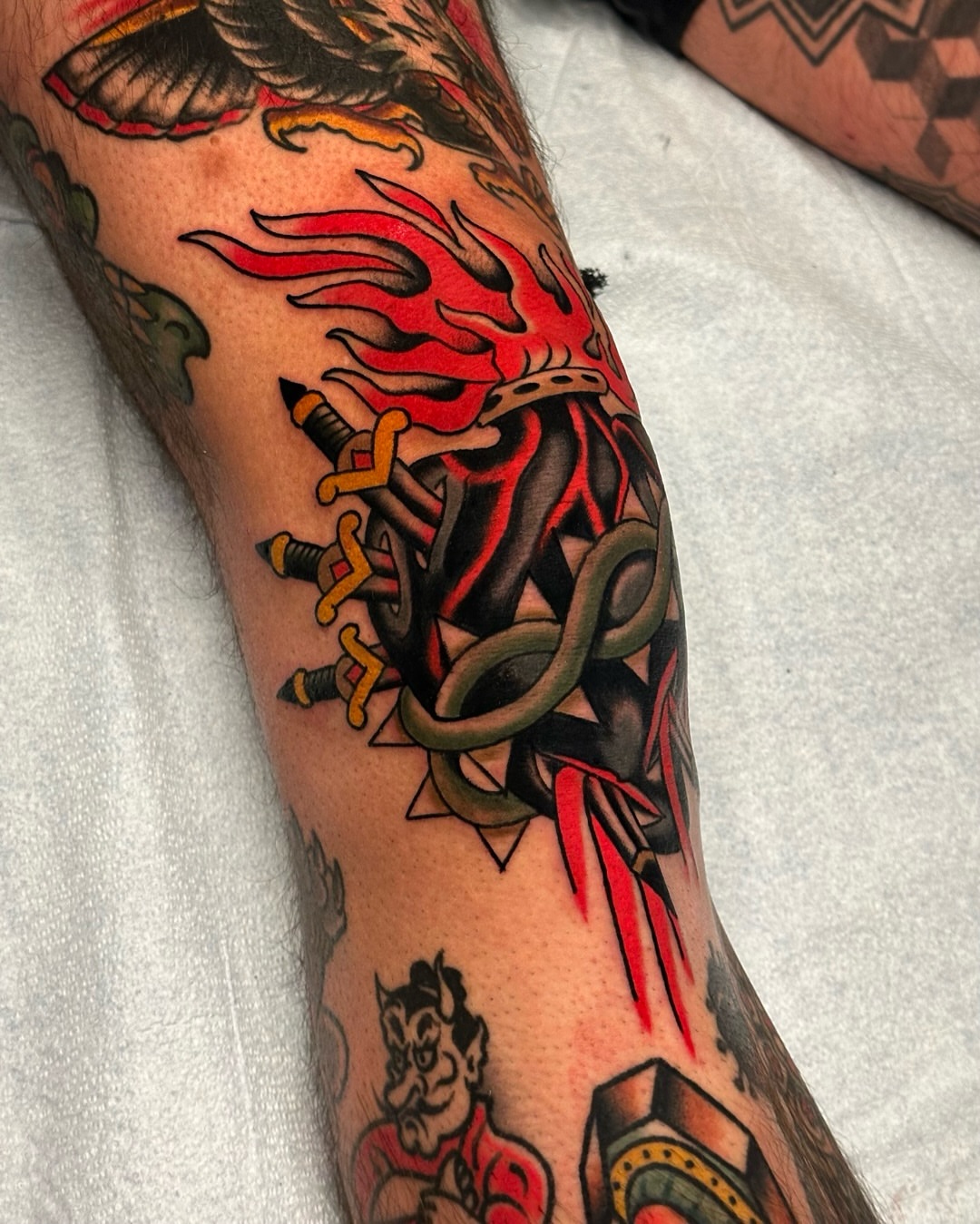 Flame and snake American traditional tattoo on the forearm by Tony Perez- Austin Texas Tattooer