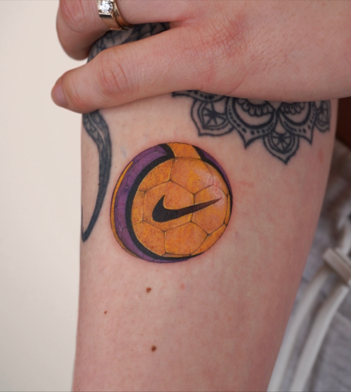 Soccer ball geometric tattoo on the forearm by Sun Child Tattoo 🌻