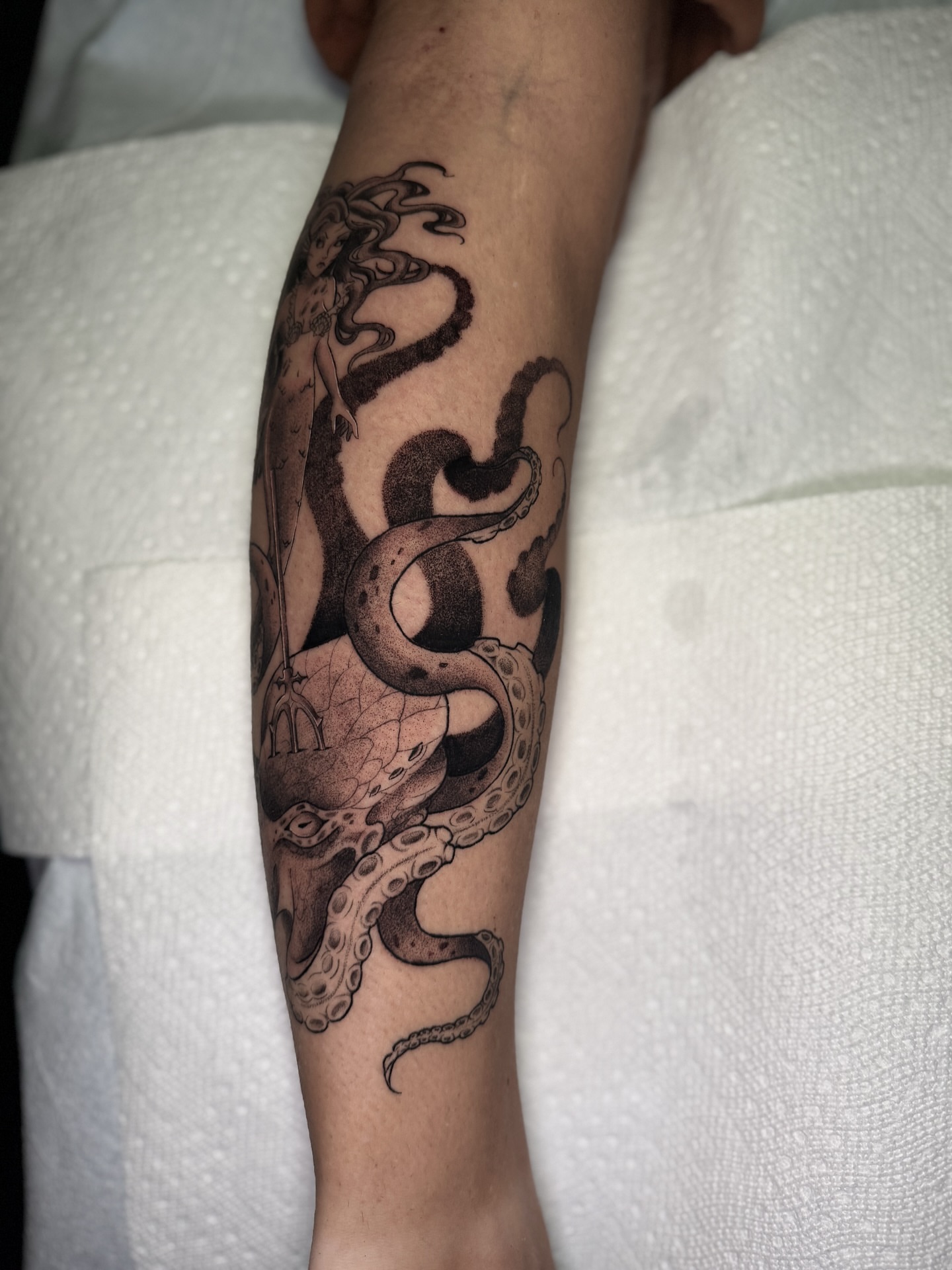 Octopus realism tattoo on the forearm by 𝕹𝖆𝖙