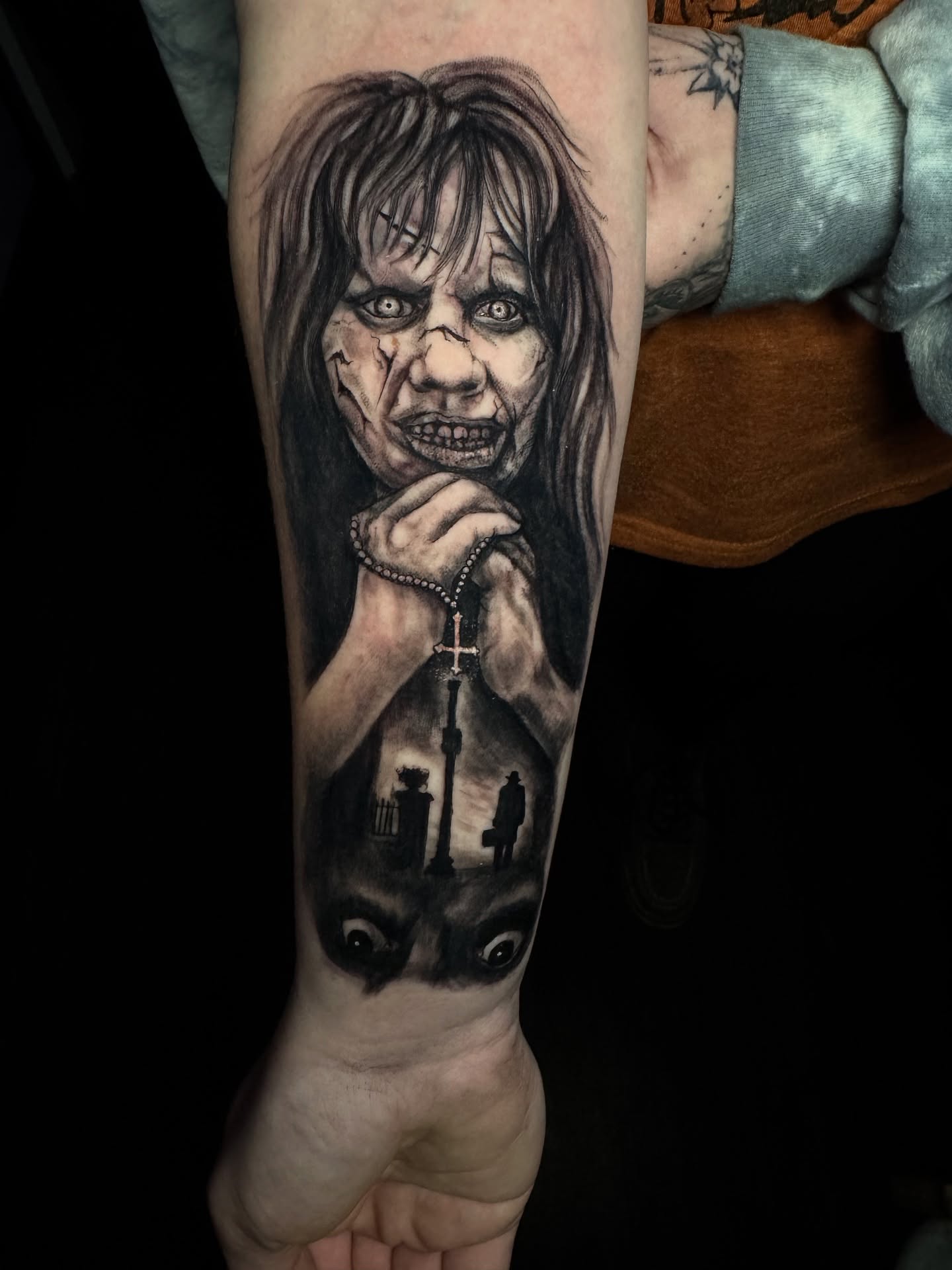Horror scene dark realism tattoo on the forearm by Jennalea