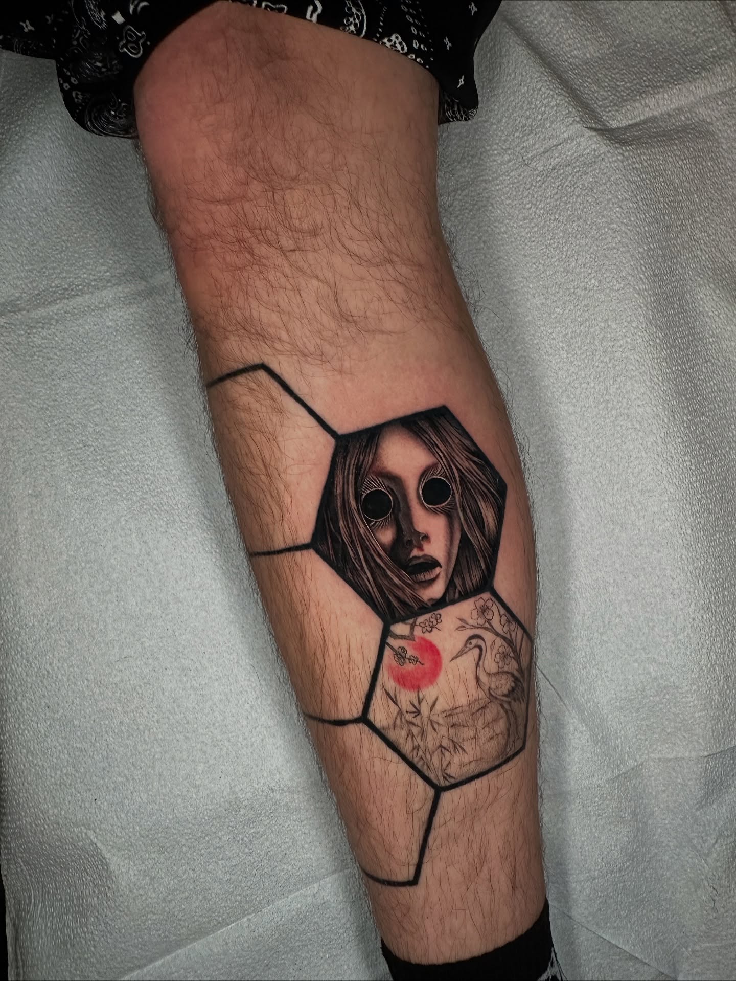 Abstract woman geometric tattoo on the forearm by Sam Minneci