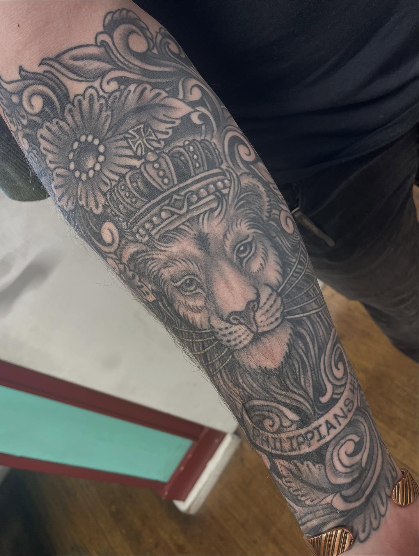 Lion realism tattoo on the forearm by Haley McMahon