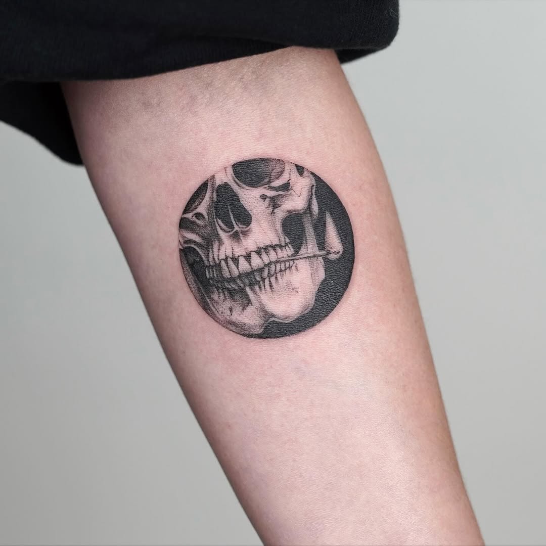 Skull dark art tattoo on the forearm by Julia