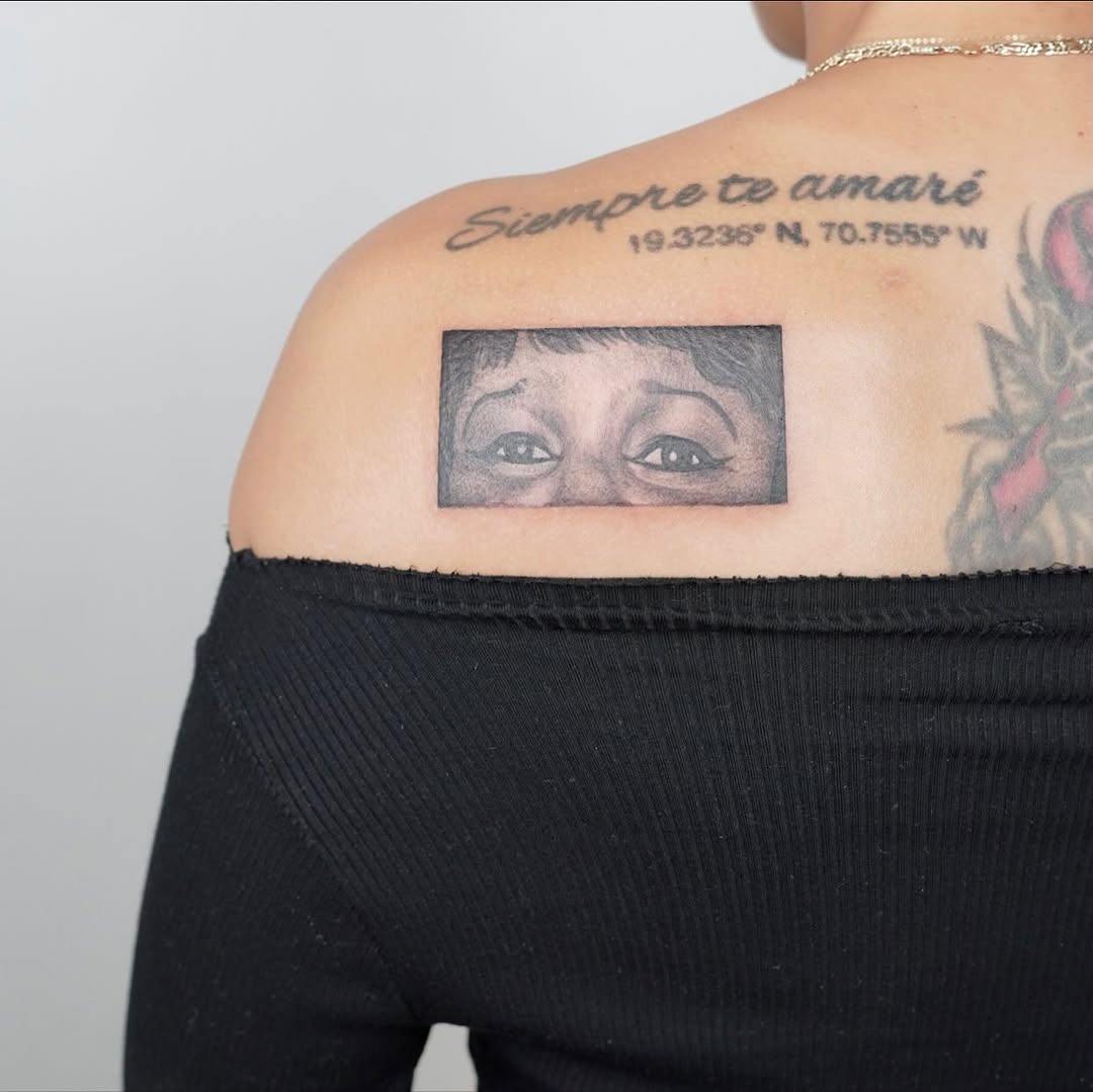 Eyes fine line tattoo on the shoulder by Julia