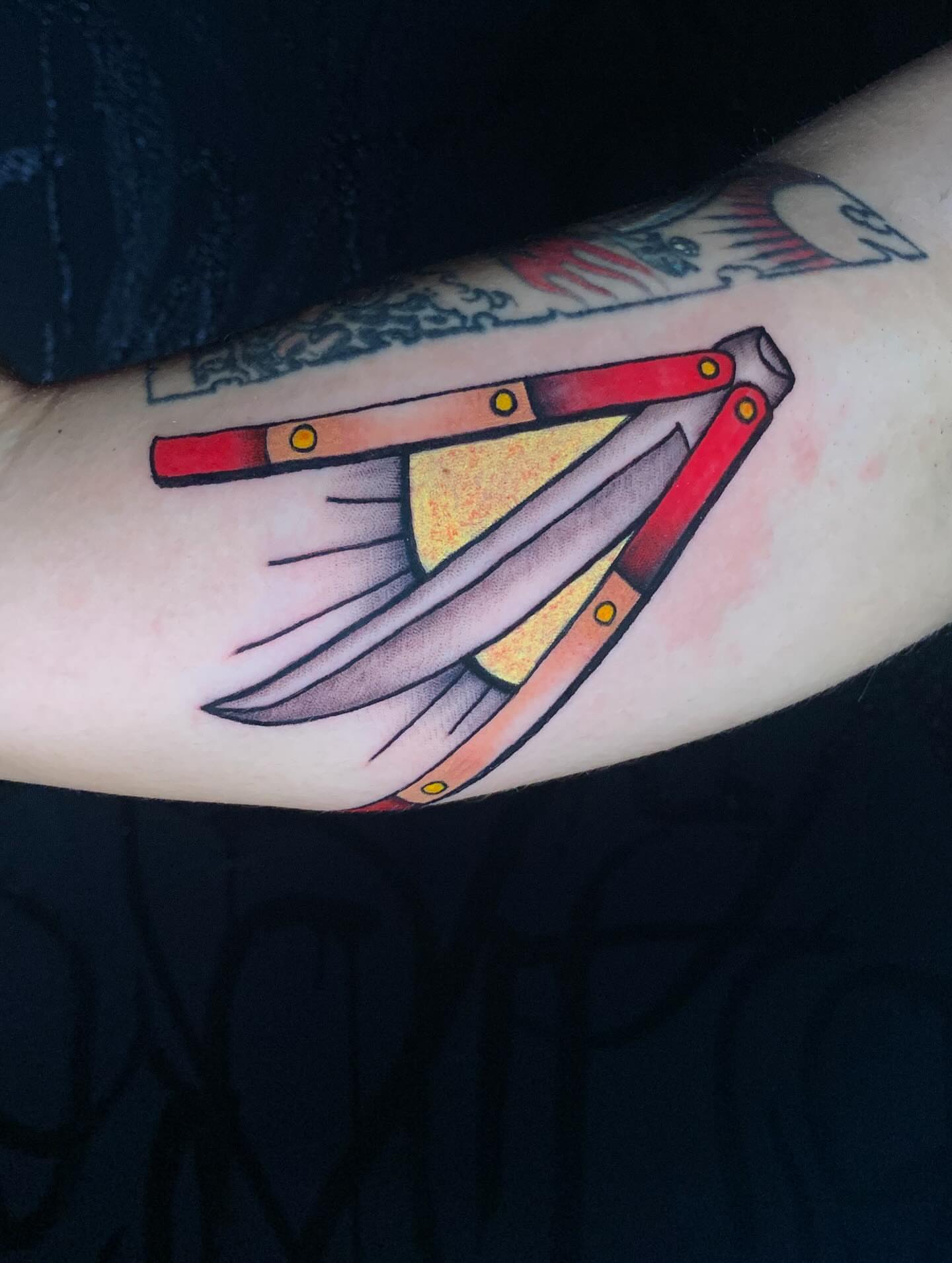 Knife American traditional tattoo on the forearm by Devon