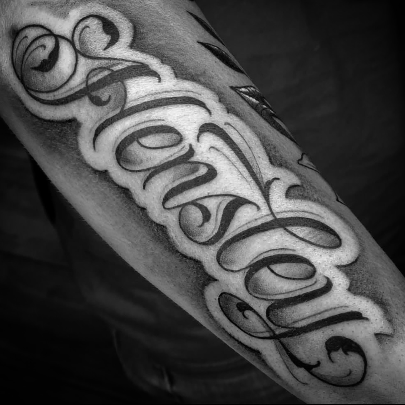 Script lettering lettering script tattoo on the forearm by Big Steve Lewis