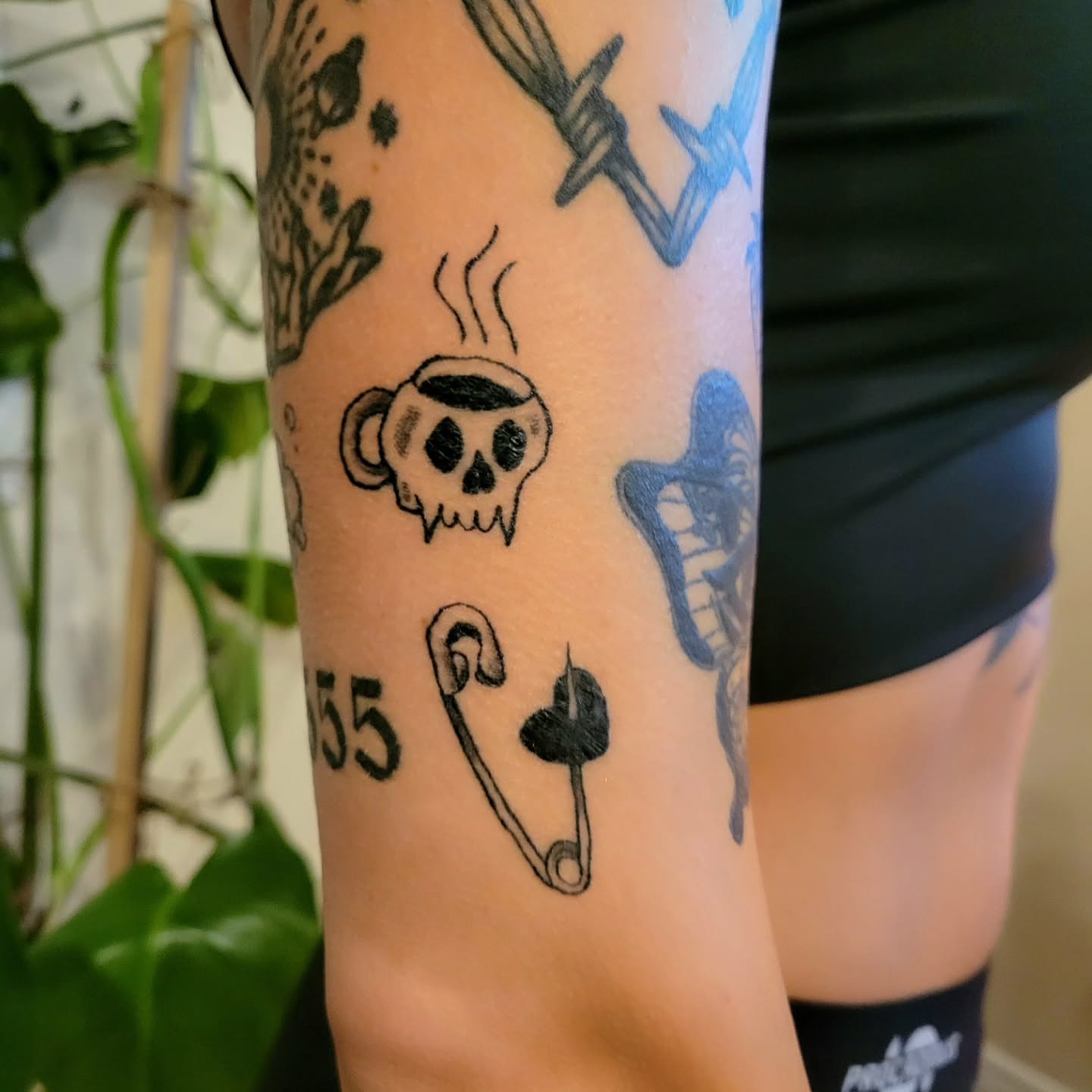 Coffee cup skull black and grey tattoo on the forearm by Kyle - Portland Oregon Tattoo Artist