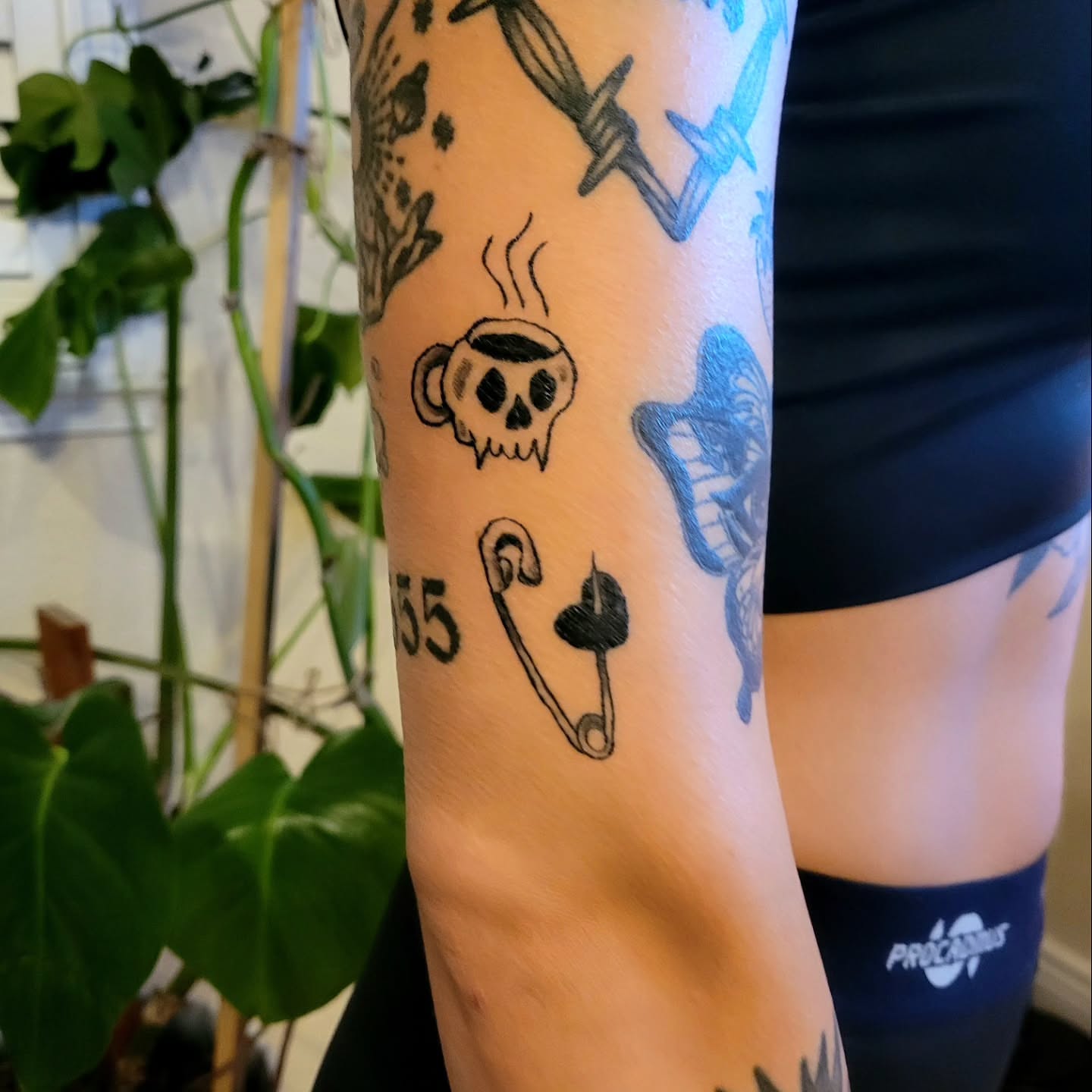 Coffee cup skull American traditional tattoo on the forearm by Kyle - Portland Oregon Tattoo Artist