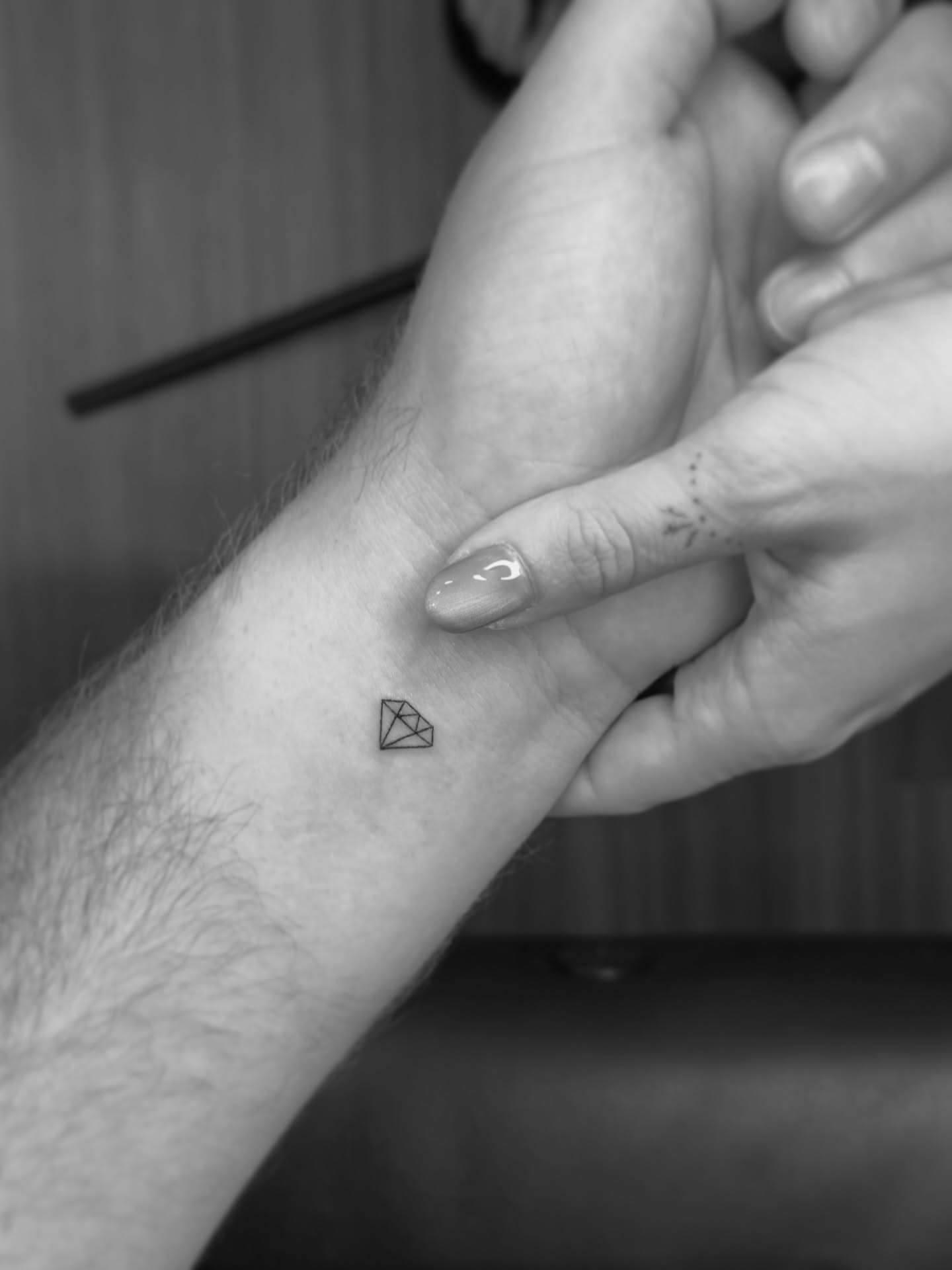 Diamond geometric tattoo on the forearm by Yuli Noama