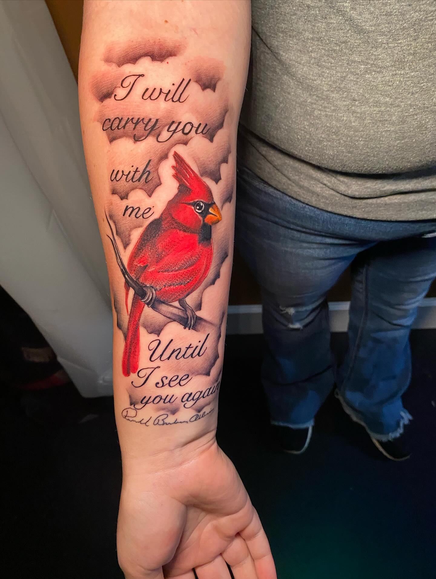 Cardinal bird realism tattoo on the forearm by Darius Armour (Tattoo Artist)