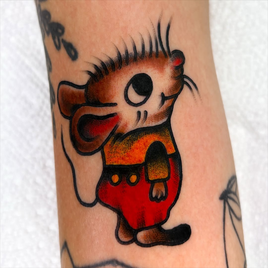 Cartoon mouse new school tattoo on the forearm by ✨ Gabi ✨