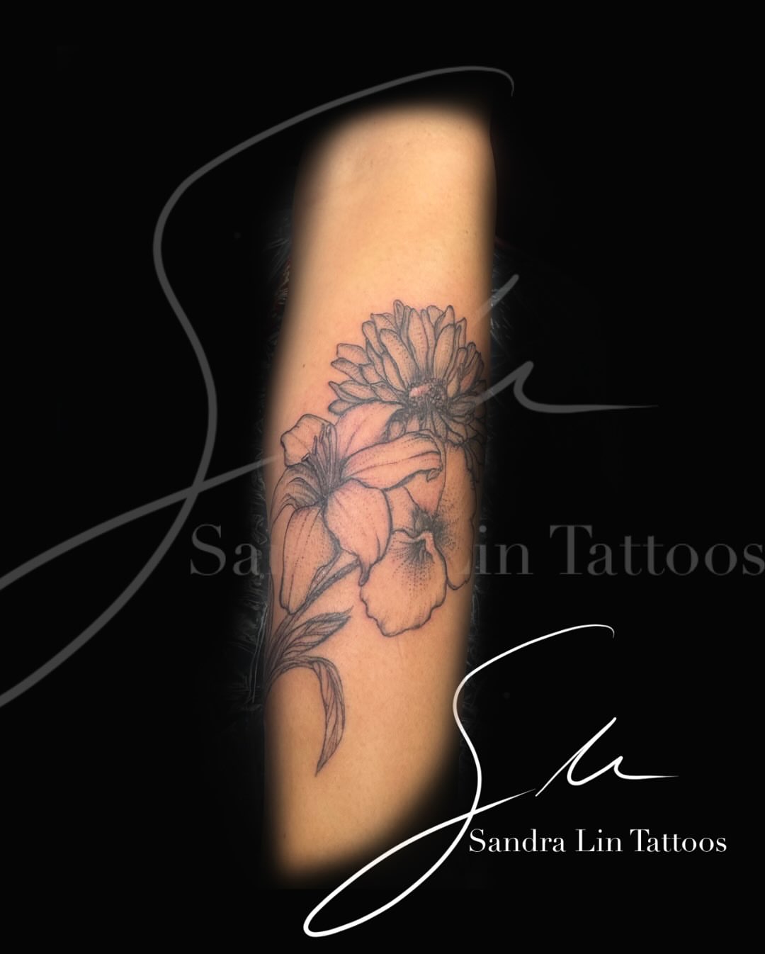 Flowers black and grey tattoo on the forearm by Sandra Lin Cue