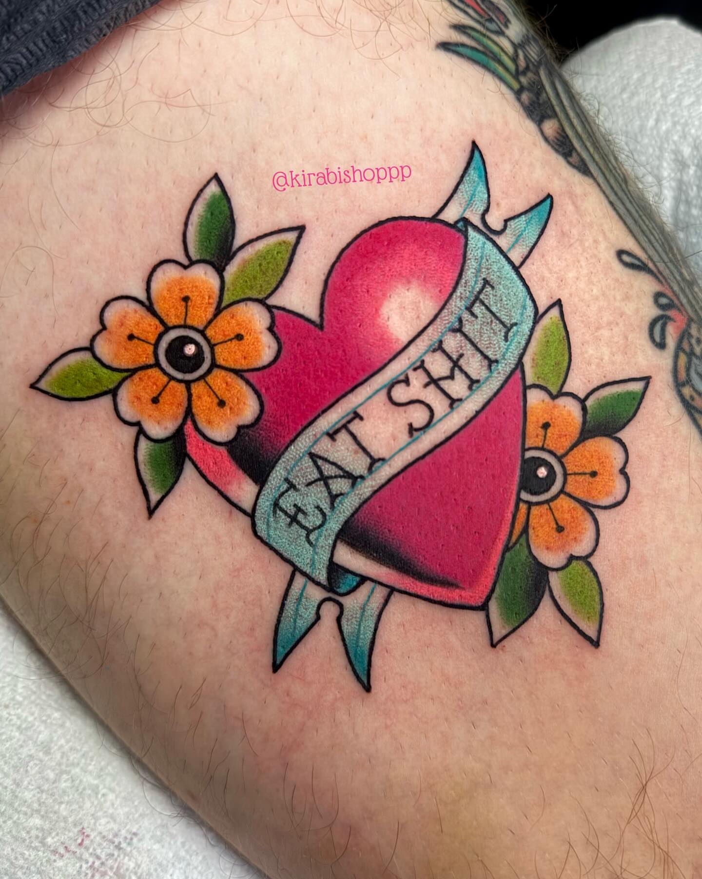 Heart with banner American traditional tattoo on the thigh by 𝔎𝔦𝔯𝔞 𝔅𝔦𝔰𝔥𝔬𝔭