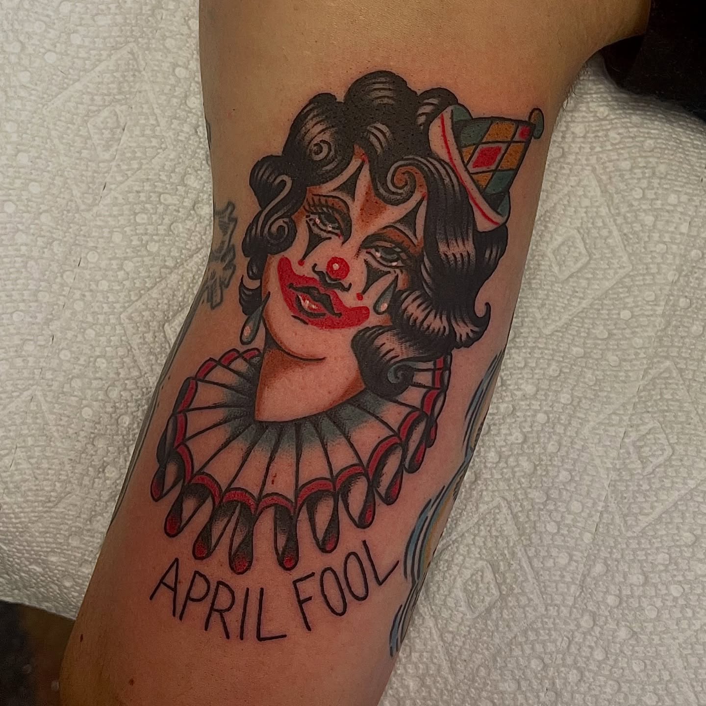 Clown American traditional tattoo on the forearm by @brandonhuckabey, Denver, Colorado