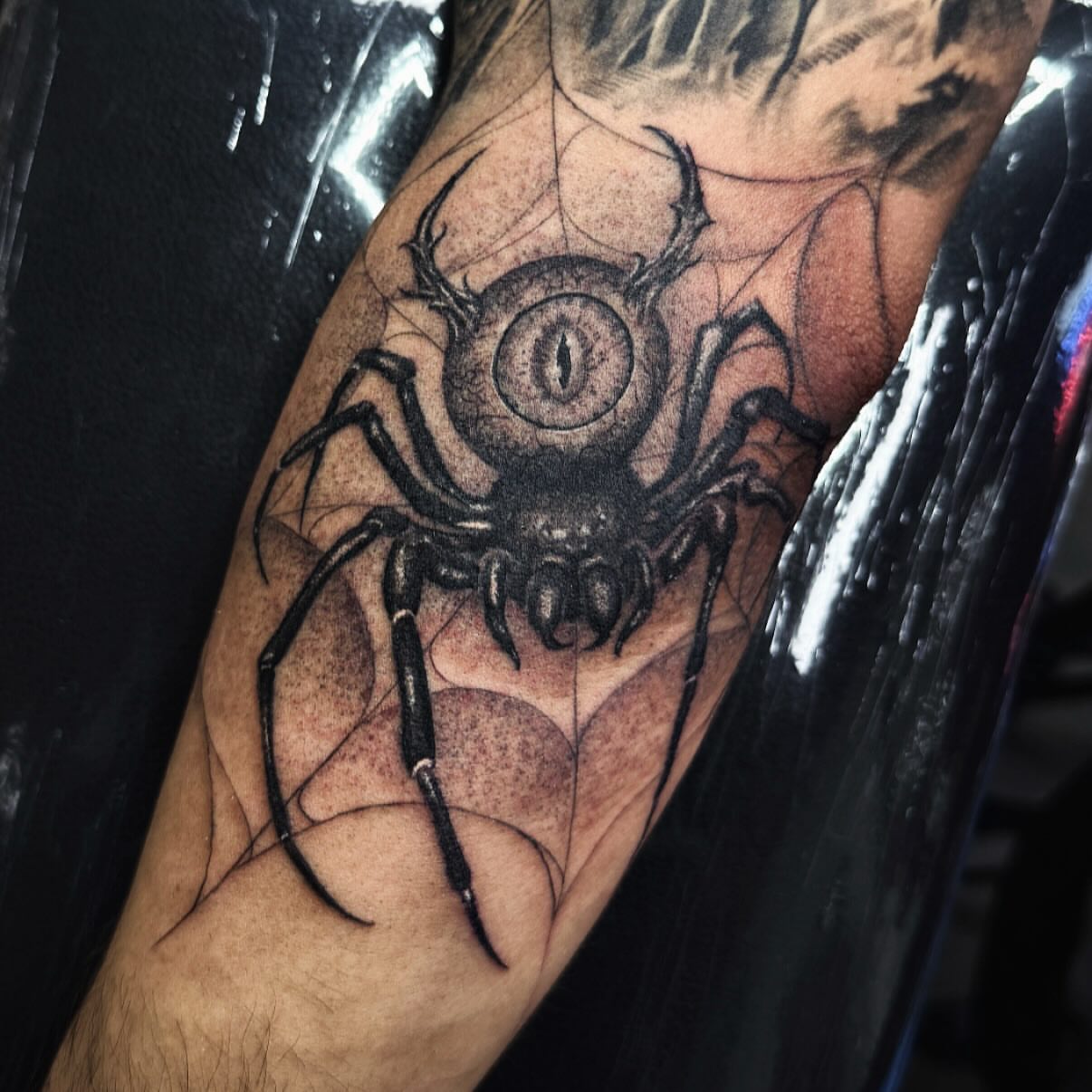 Spider realism tattoo on the forearm by Joey Moreno