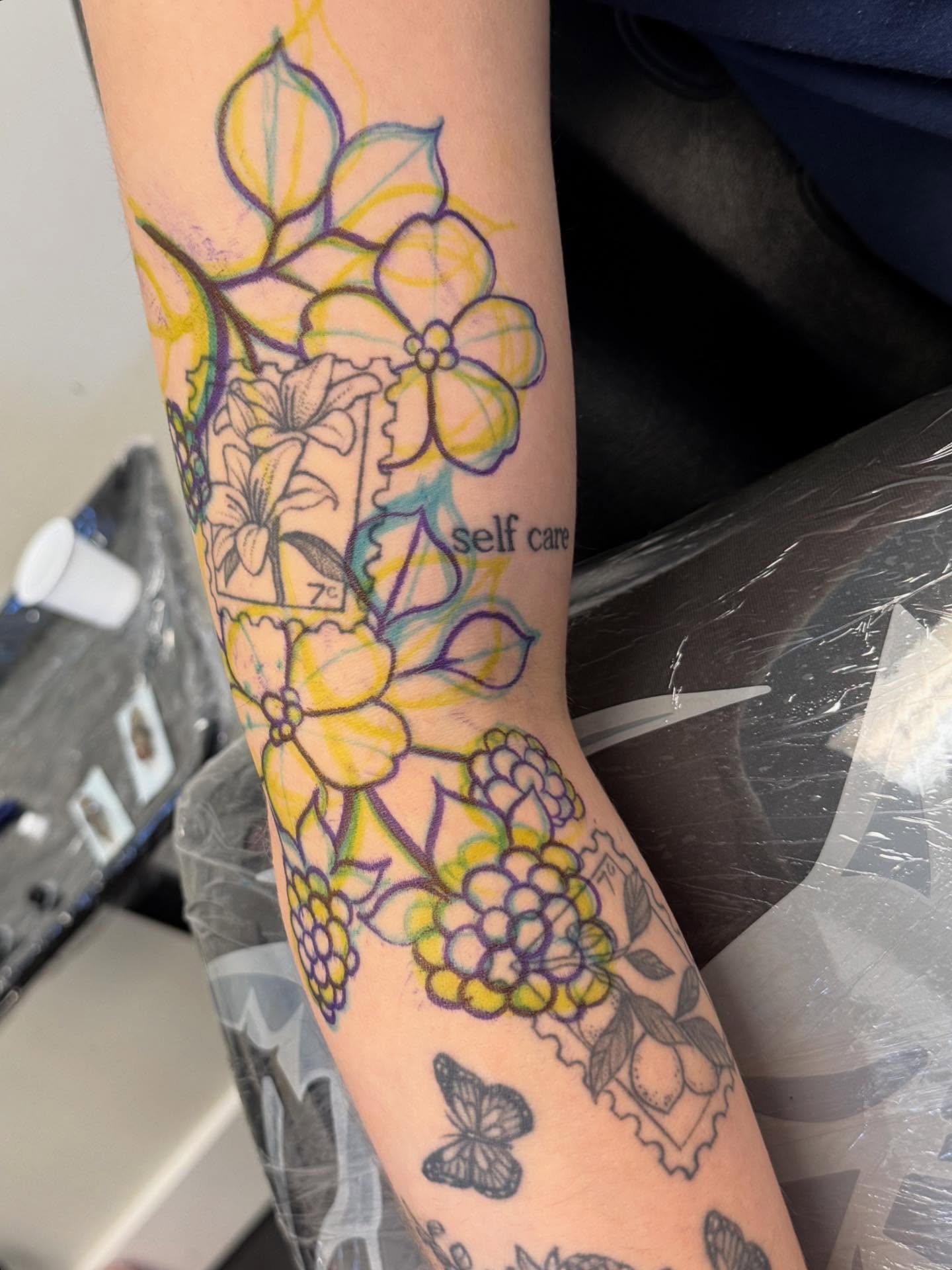 Floral bouquet new school tattoo on the forearm by Connie Fiorino - Tattoo Artist