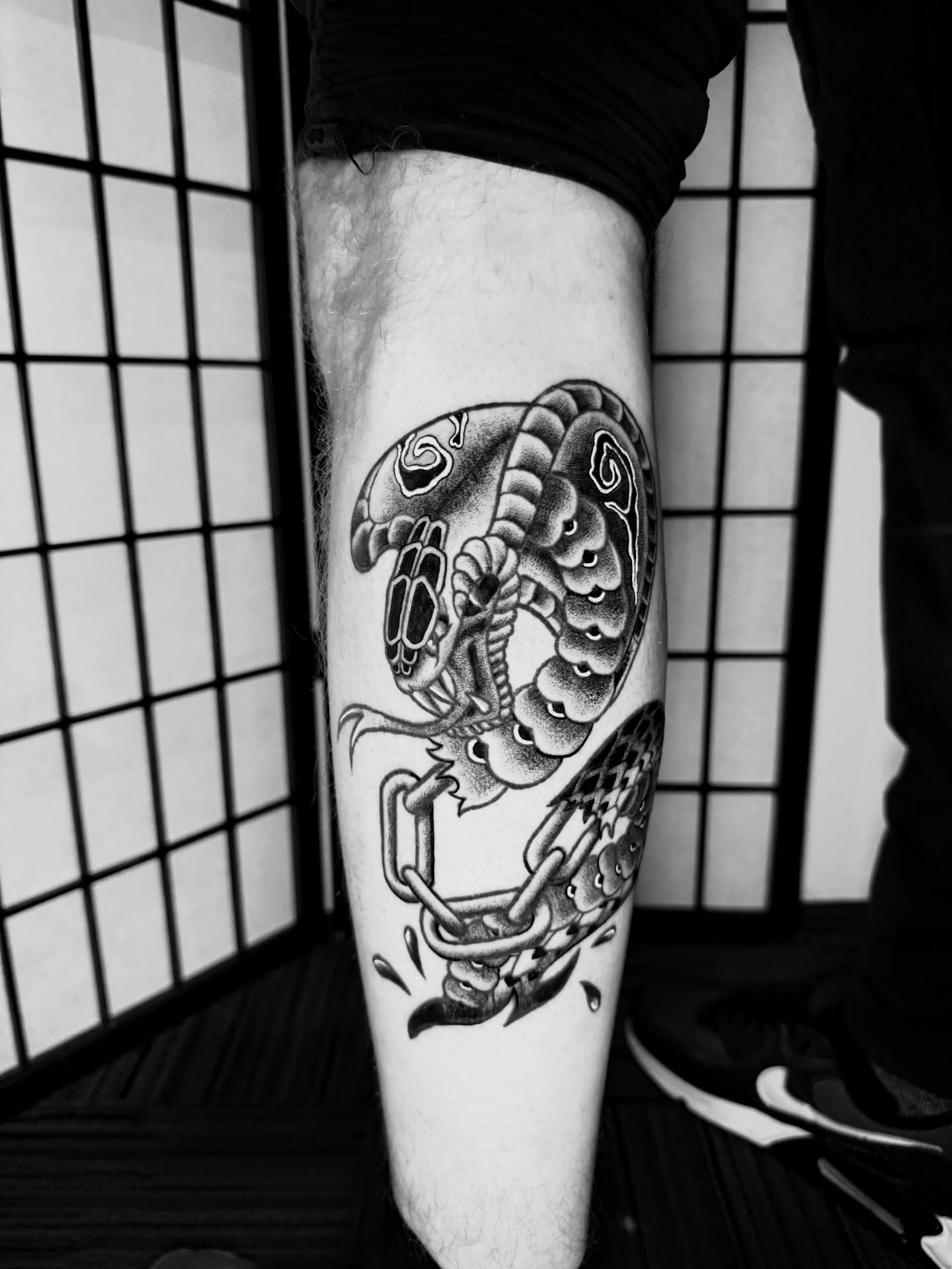 Snake dotwork tattoo on the forearm by Austin Poliszuk, Minneapolis, Minnesota