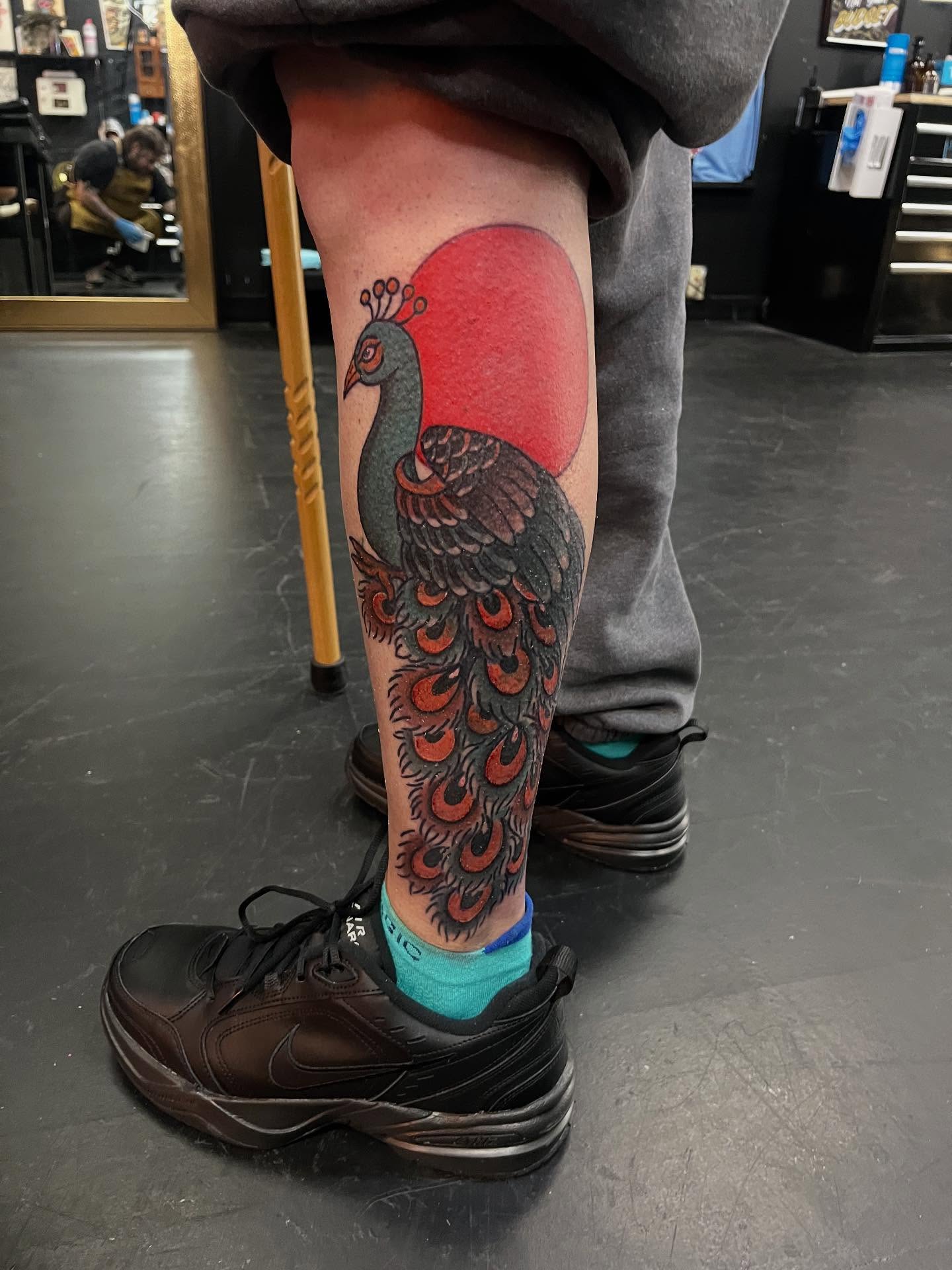 Peacock American traditional tattoo on the leg by CRAIG B⛓️ Cincinnati Tattoo Artist