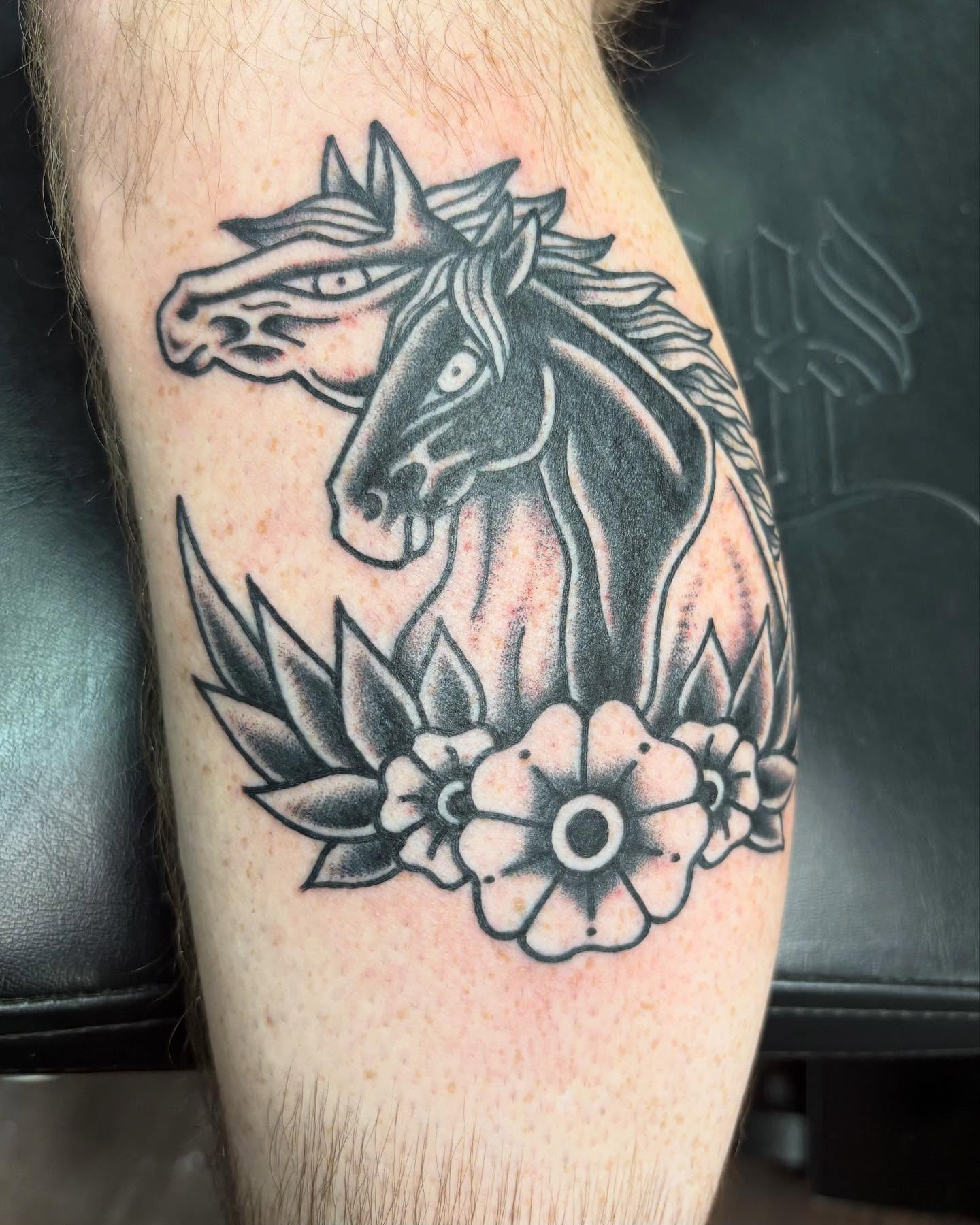 Horses and flowers black and grey tattoo on the forearm by ✨Shelby ✨