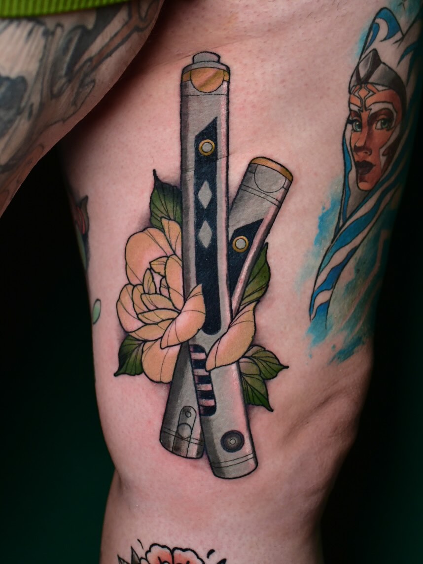 Lightsaber and flower American traditional tattoo on the thigh by Karina πΌ Orange County Tattoo Artist