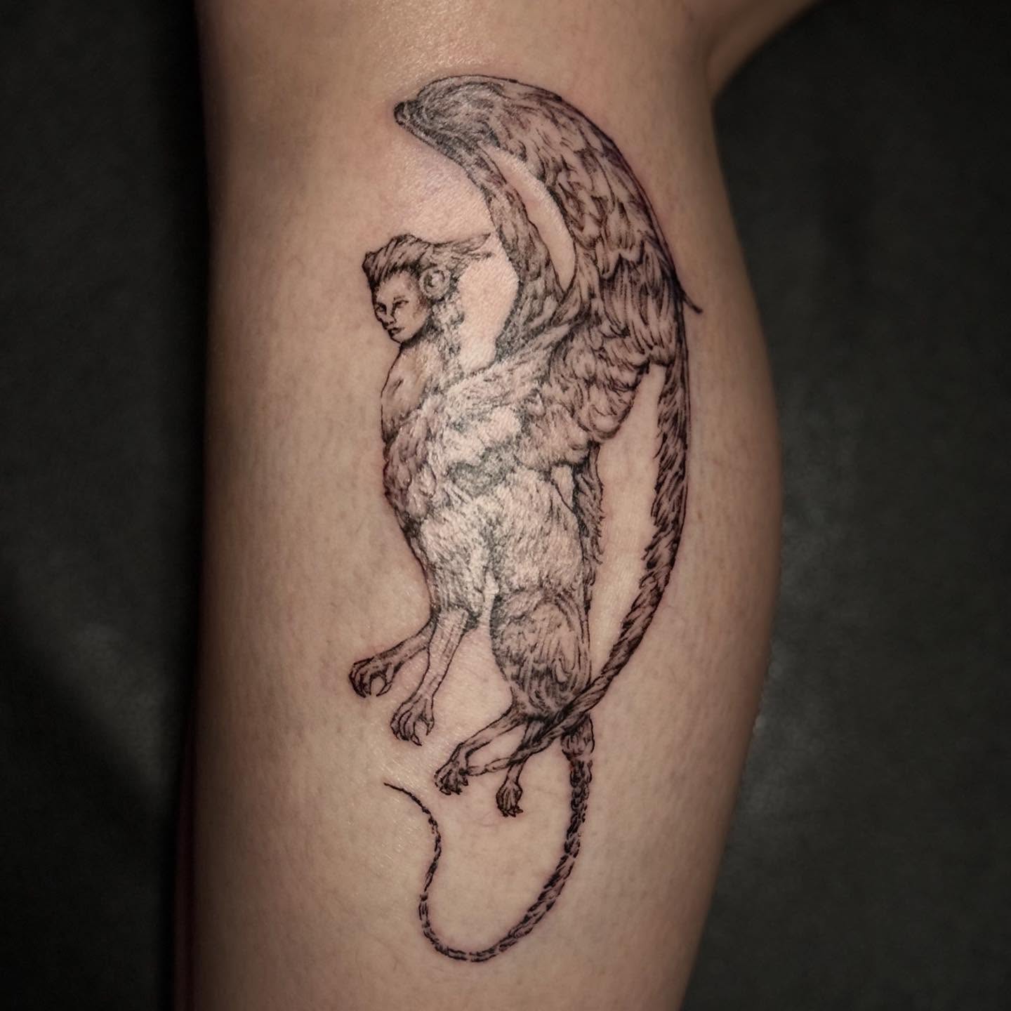 Winged creature black and grey tattoo on the forearm by Cullen-Lee