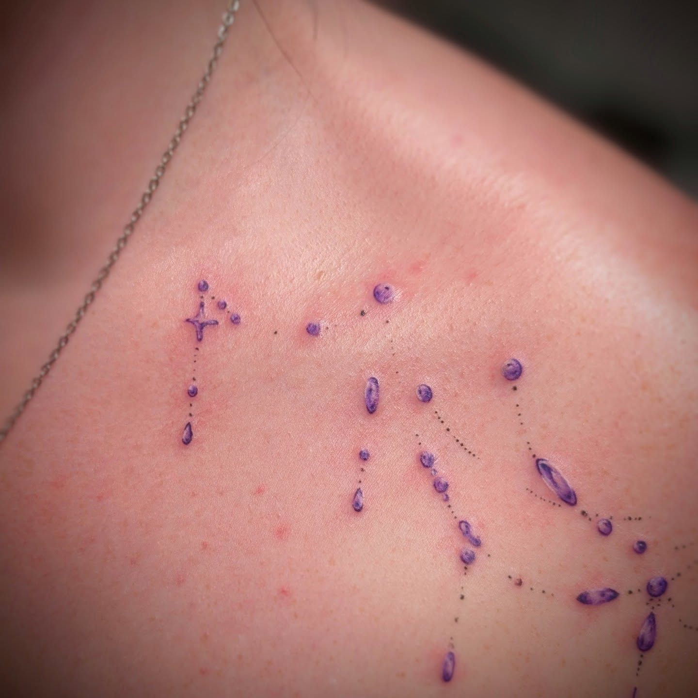 Constellation dotwork tattoo on the chest by Rhiannon