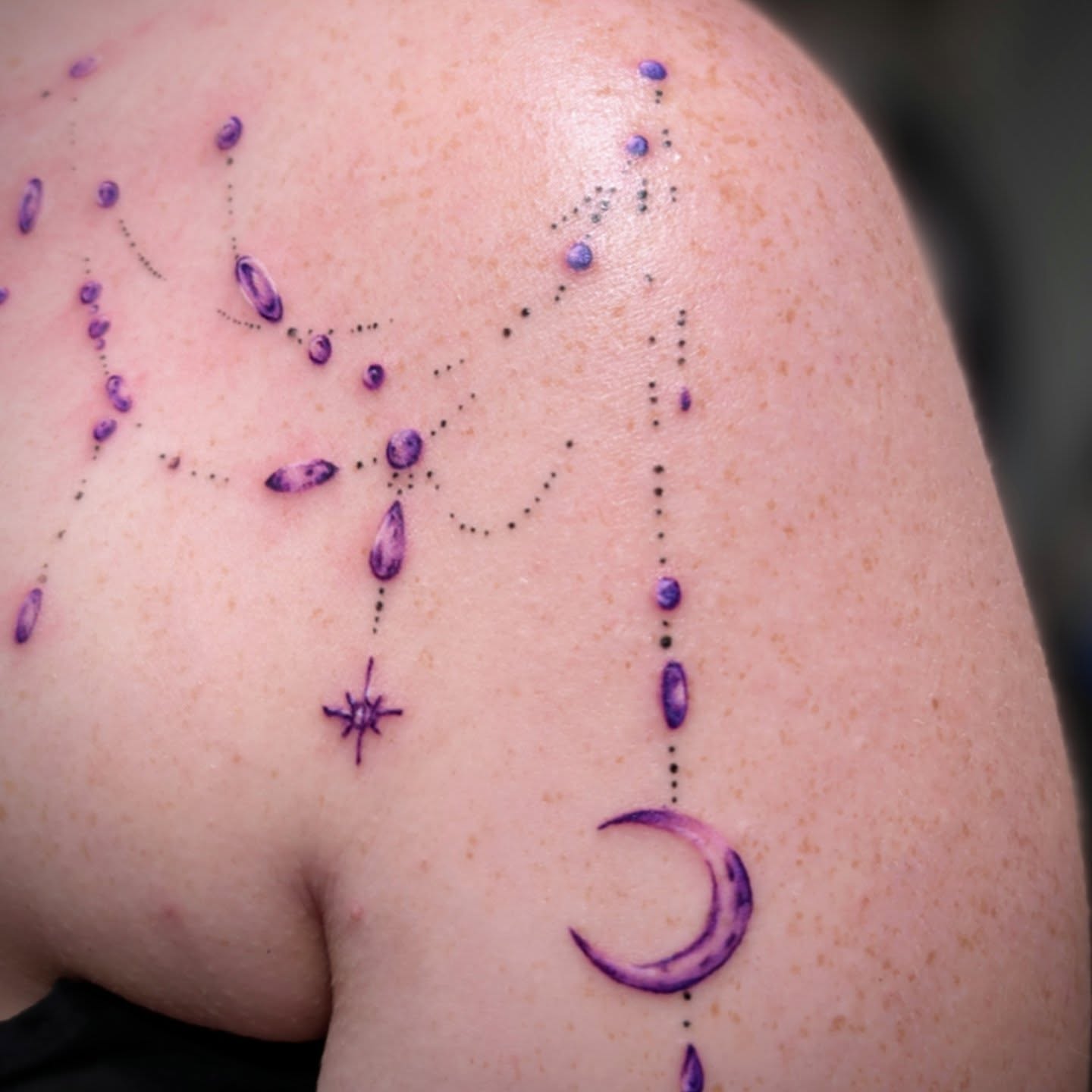 Galaxy dotwork tattoo on the shoulder by Rhiannon