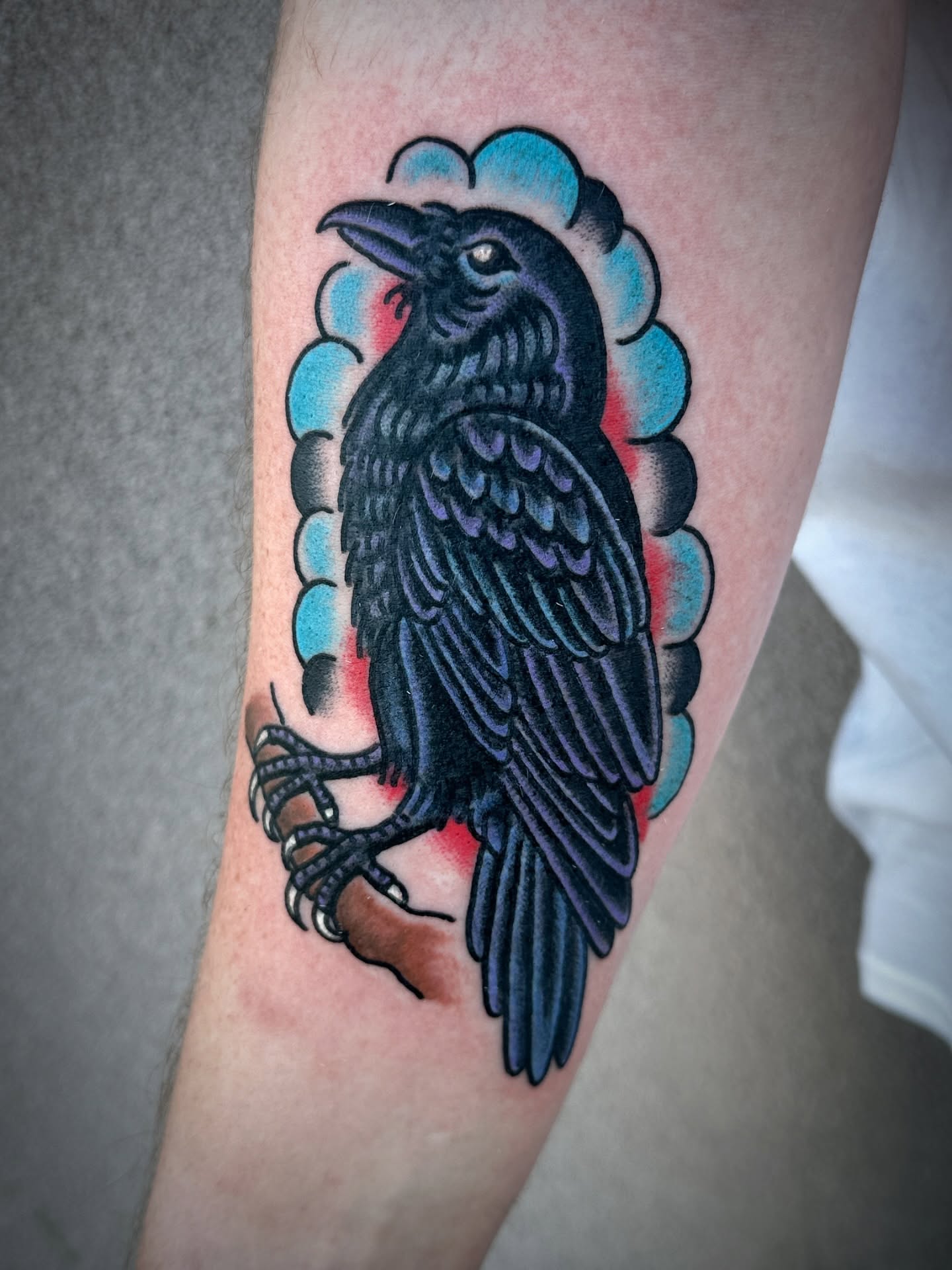 Crow American traditional tattoo on the forearm by Chris Blanchard
