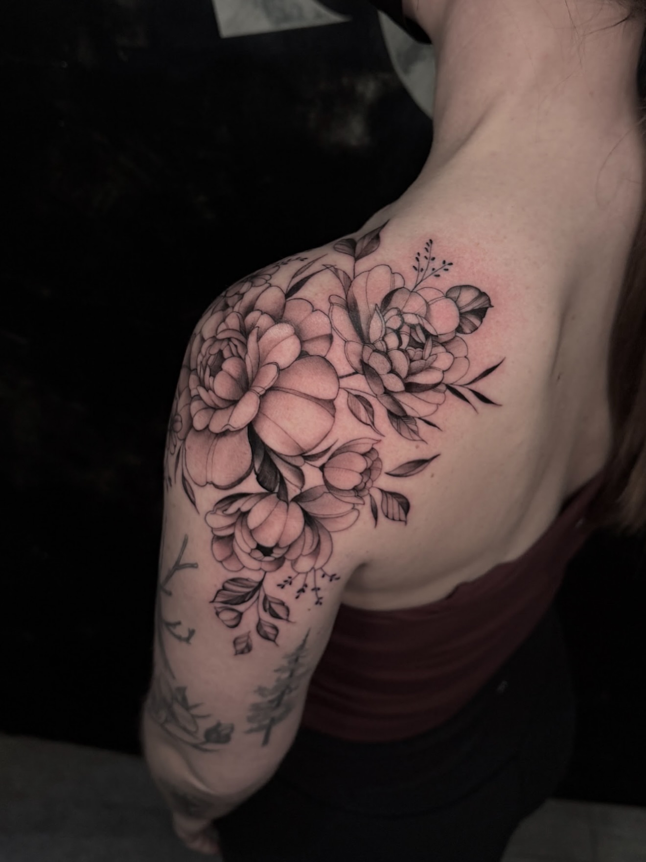 Floral bouquet black and grey tattoo on the shoulder by Mel K Lockett - Nashville Tattoo Artist