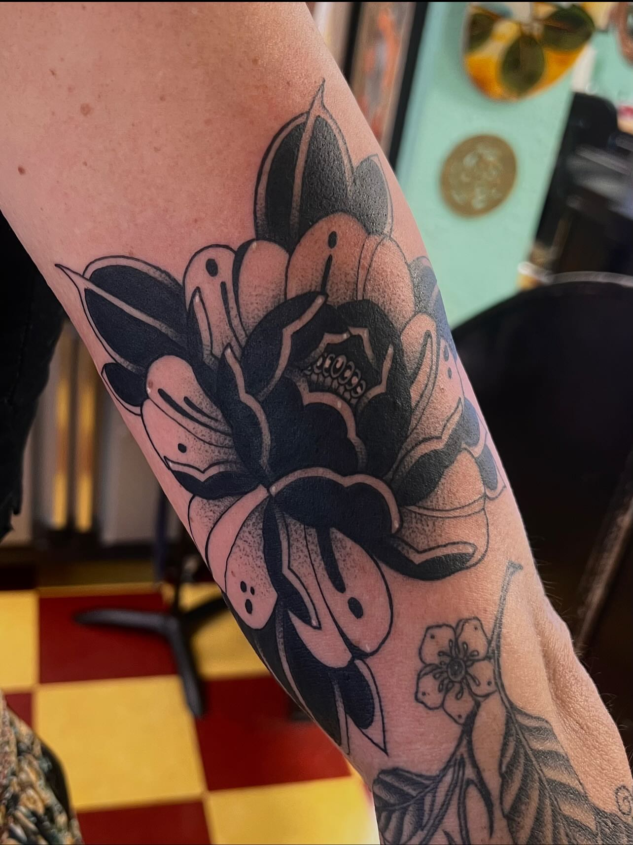 Flower American traditional tattoo on the forearm by ♛Mollie Evans