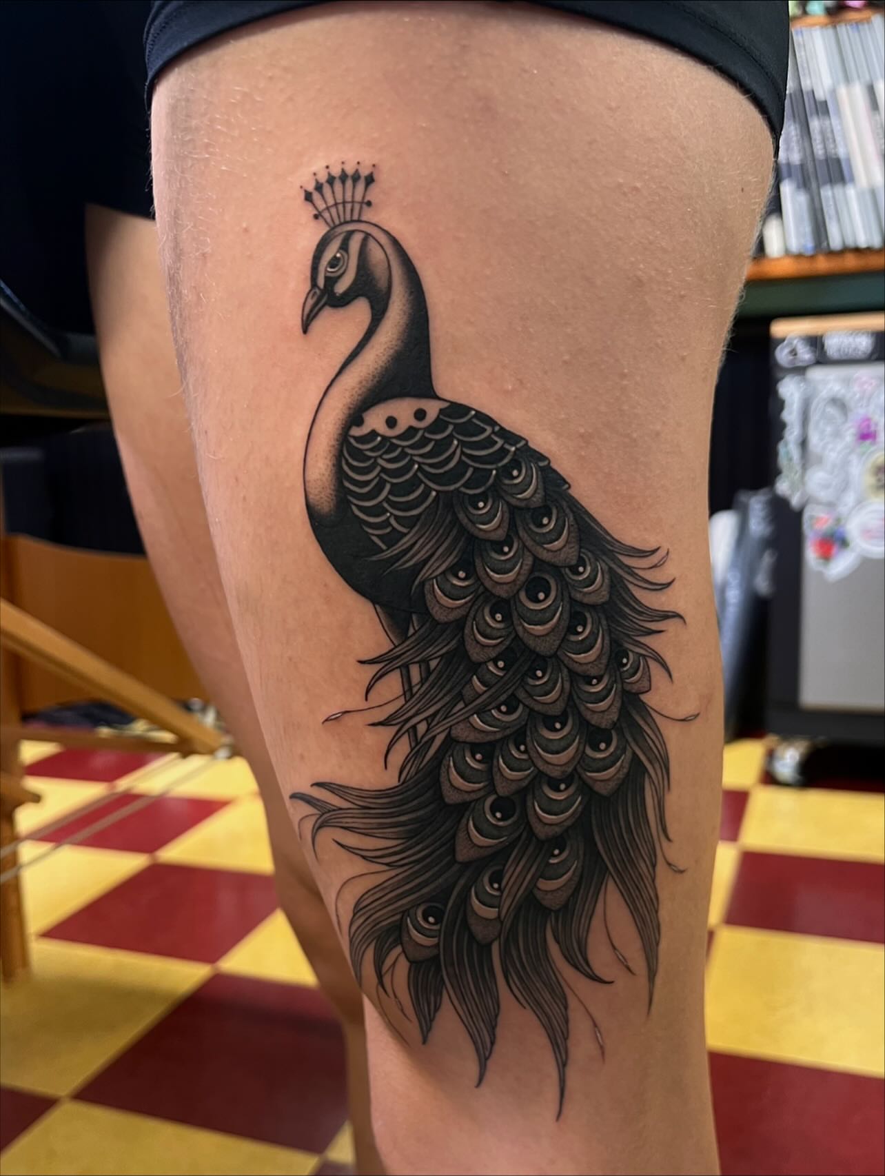 Peacock black and grey tattoo on the thigh by ♛Mollie Evans