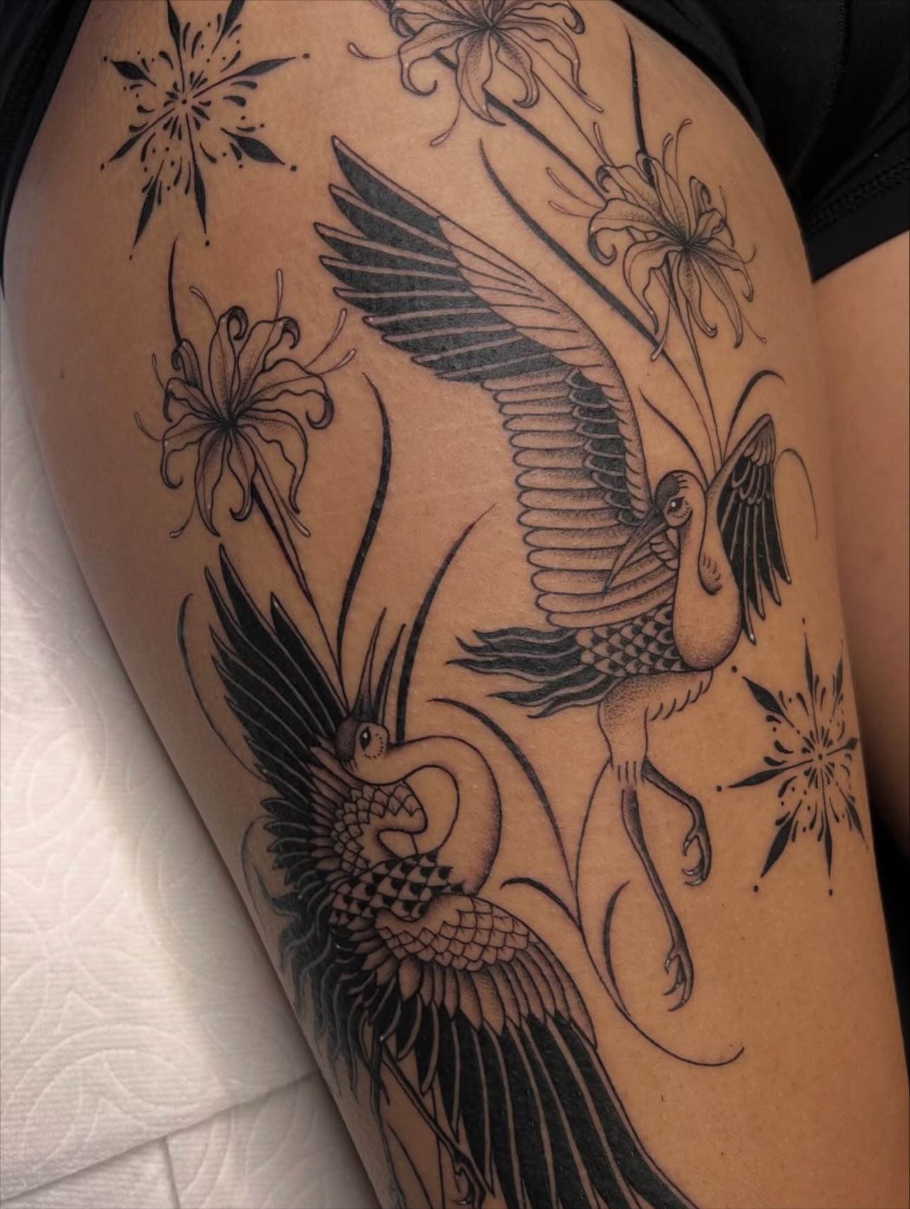 Birds and flowers black and grey tattoo on the thigh by ♛Mollie Evans